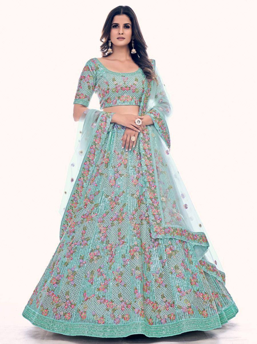 Mint green floral embroidered lehenga choli with sheer dupatta, perfect for Indian weddings and festive occasions