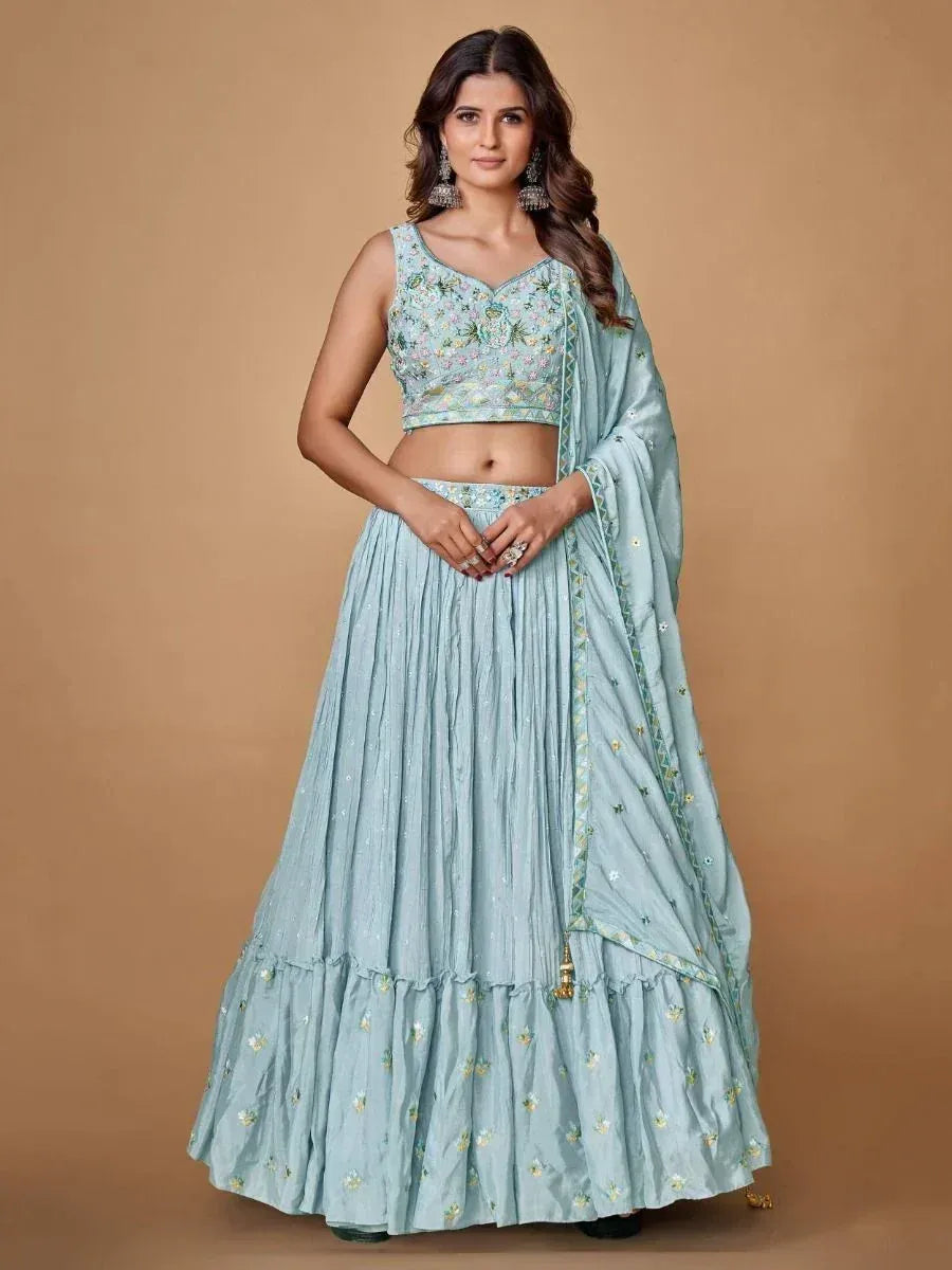 Light blue embroidered lehenga choli with floral detailing, perfect for Indian ethnic wear occasions