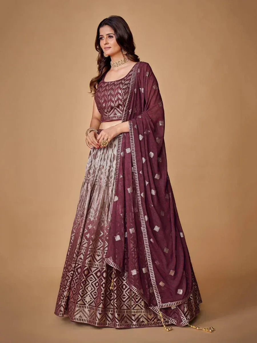 Maroon embroidered lehenga choli with geometric patterns, perfect for Indian ethnic wear occasions