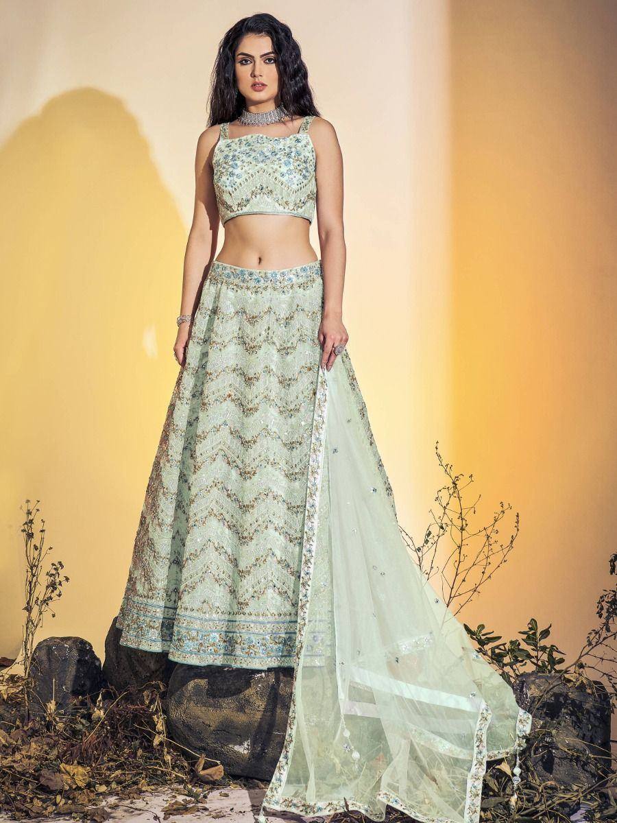 Mint green embroidered lehenga choli with sheer dupatta, perfect for Indian ethnic occasions