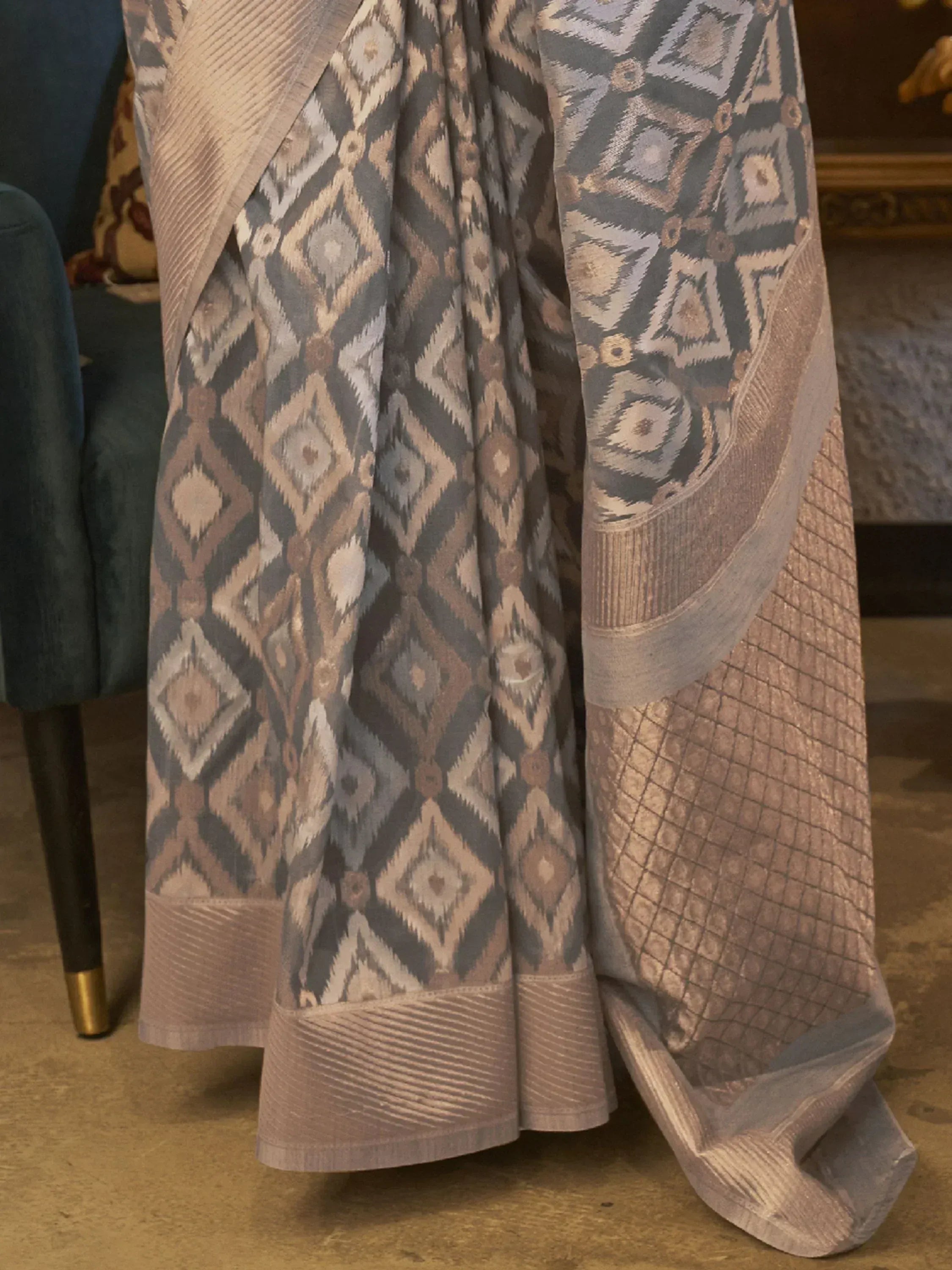 Elegant ethnic saree with geometric diamond pattern in grey and beige, perfect for Indian occasions.