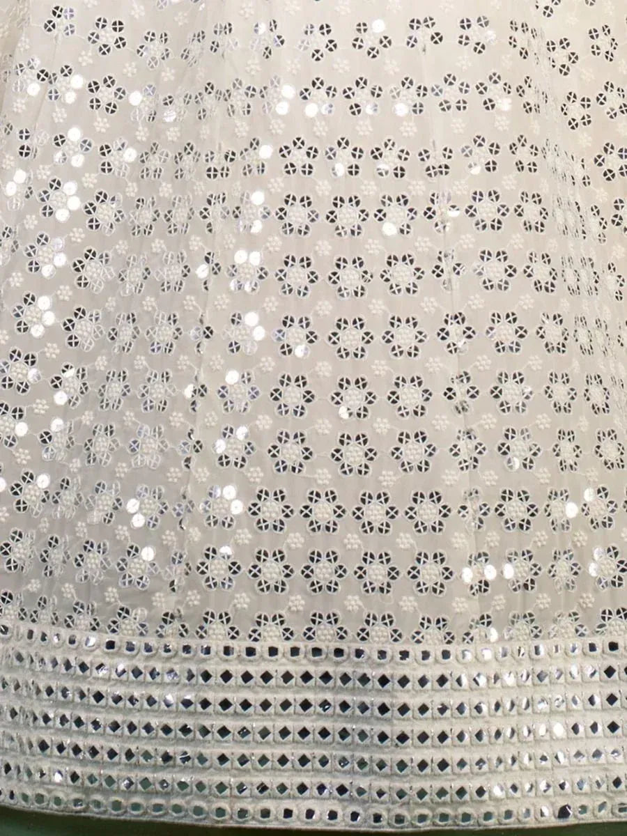 White ethnic gown with floral cutwork and sequin detailing, perfect for Indian festive wear