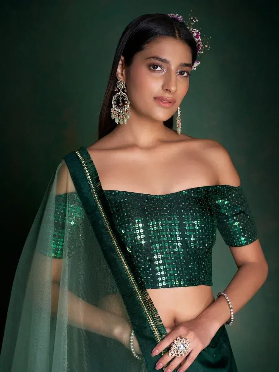 Emerald green sequin off-shoulder blouse with sheer dupatta, perfect for Indian ethnic wear occasions