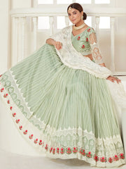 Glamorous Pista Green Thread Embroidered Net Festival Wear Lehenga Choli