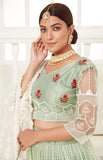 Glamorous Pista Green Thread Embroidered Net Festival Wear Lehenga Choli