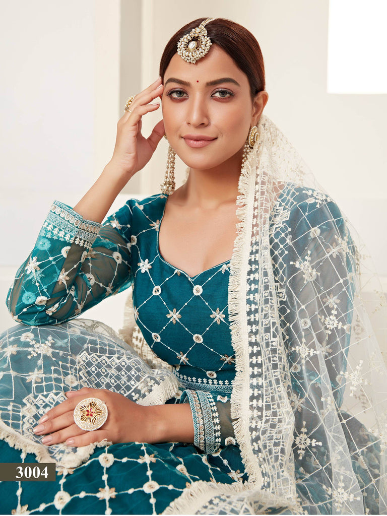 Charming Blue Thread Embroidered Net Festival Wear Lehenga Choli