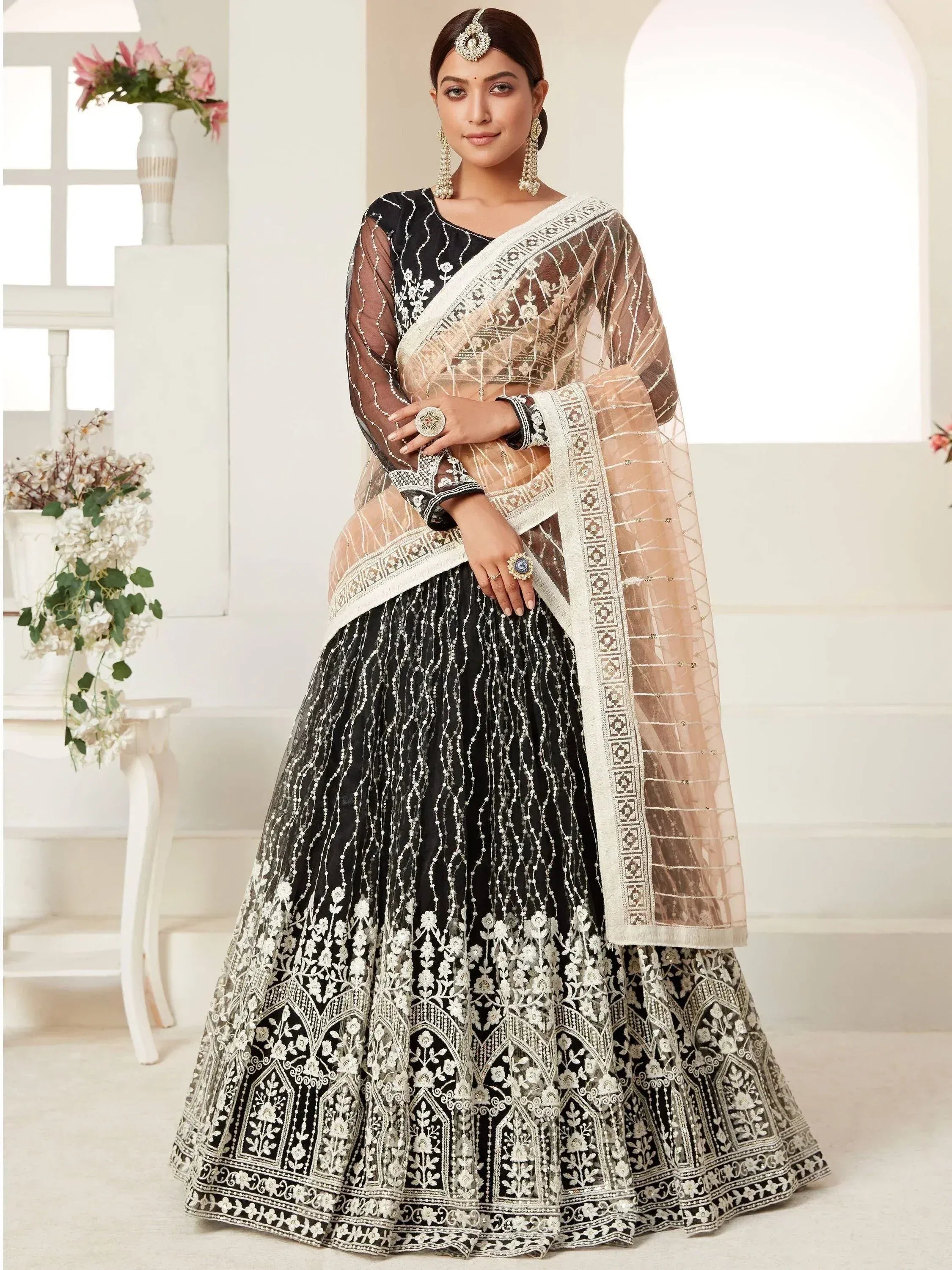 Black and white embroidered lehenga choli with sheer dupatta, perfect for Indian ethnic occasions