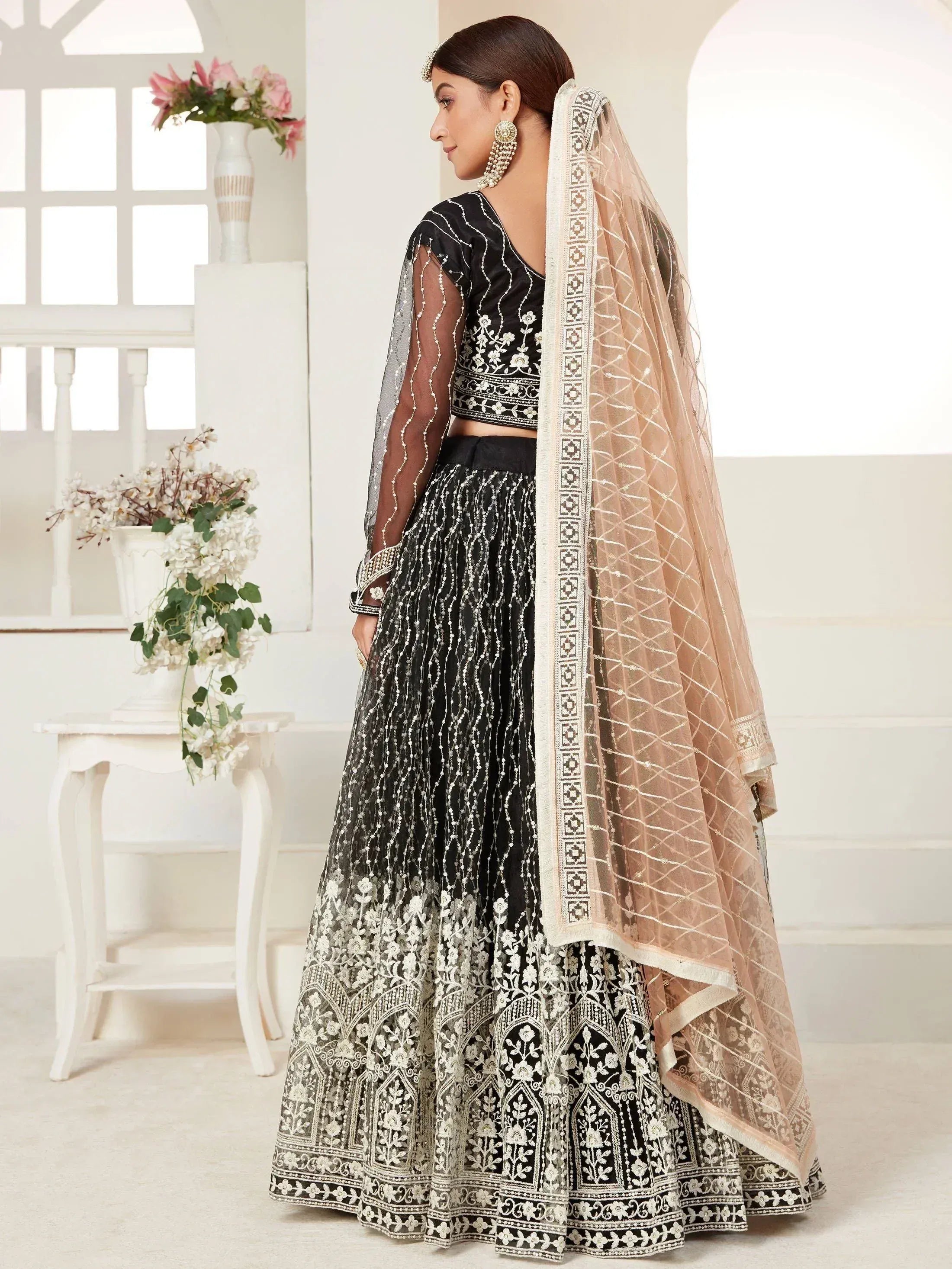 Black and white embroidered lehenga choli with sheer dupatta, Indian ethnic wear for weddings and festivals