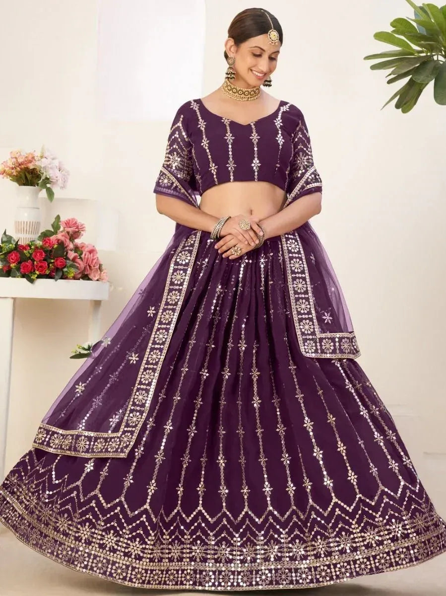 Purple designer lehenga choli with gold mirror work, perfect for Indian ethnic wear events