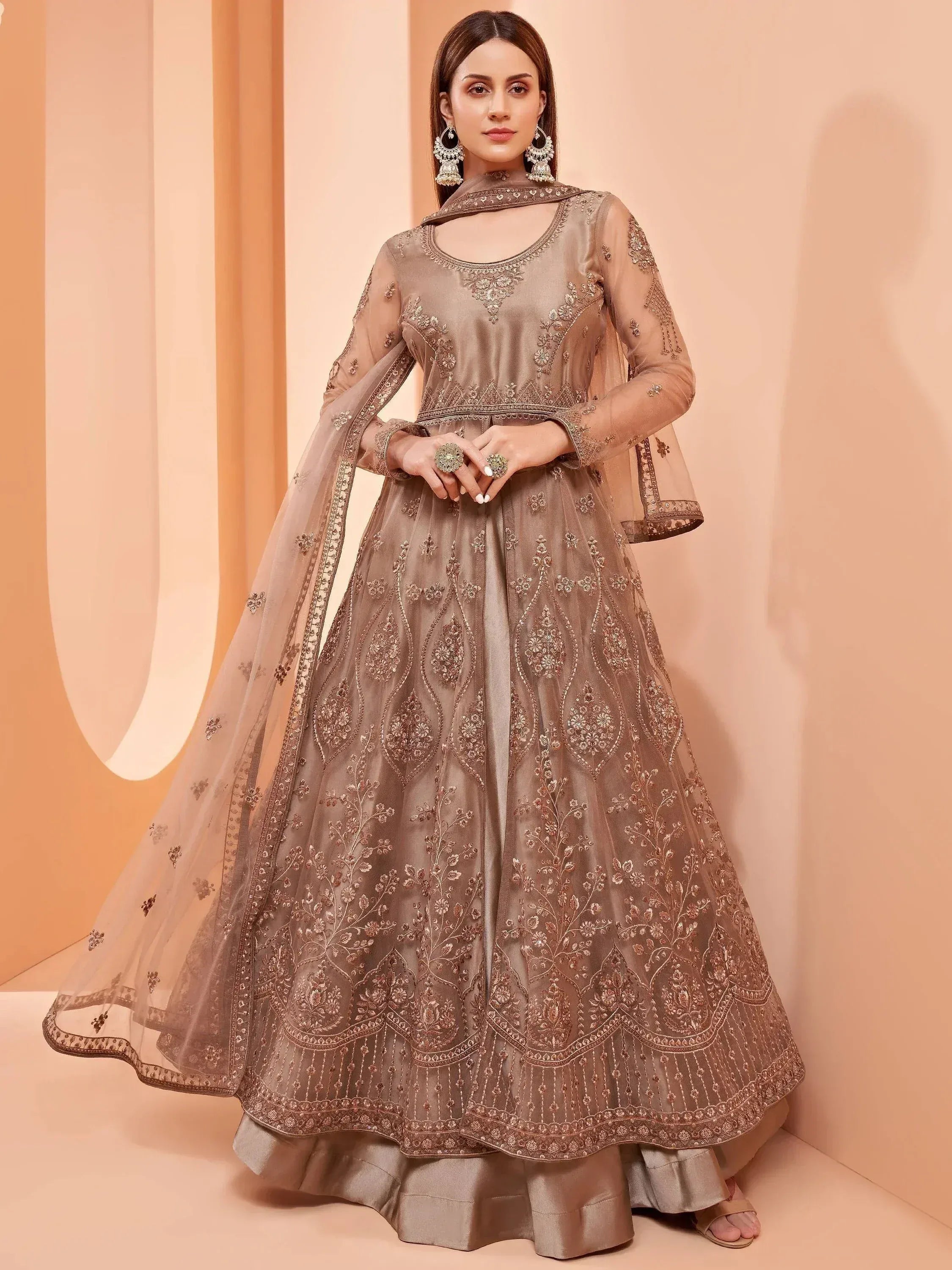 Elegant brown embroidered lehenga choli with sheer dupatta, perfect for Indian ethnic wear