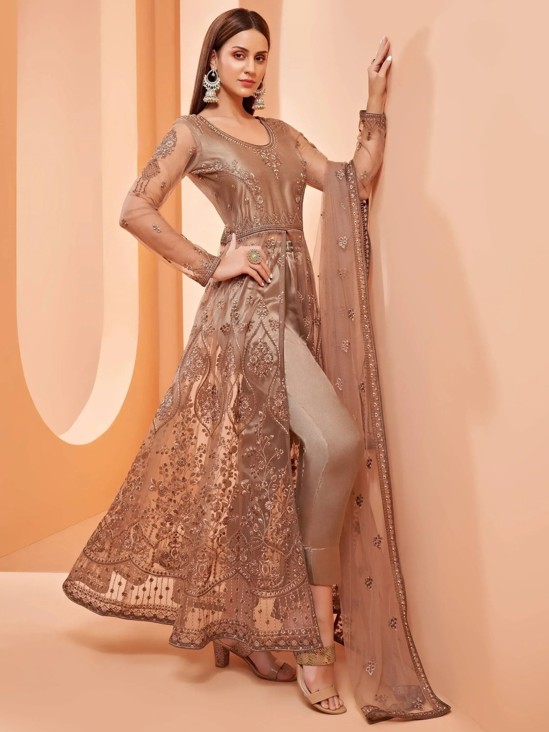 Elegant beige embroidered anarkali suit with sheer dupatta, perfect for Indian ethnic wear occasions.