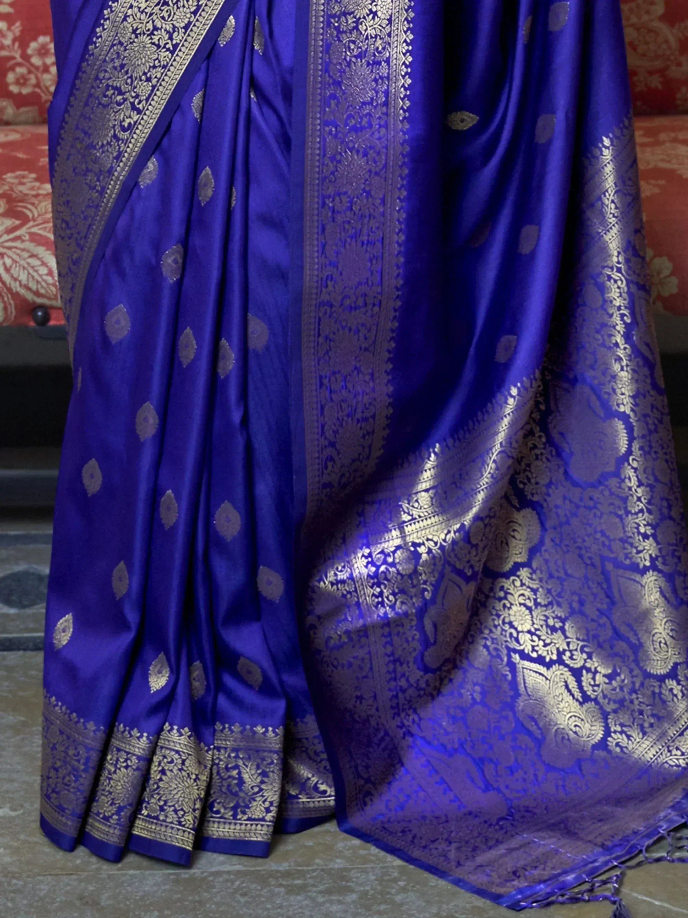 Royal blue silk saree with gold zari embroidery, perfect for Indian ethnic wear and festive occasions.