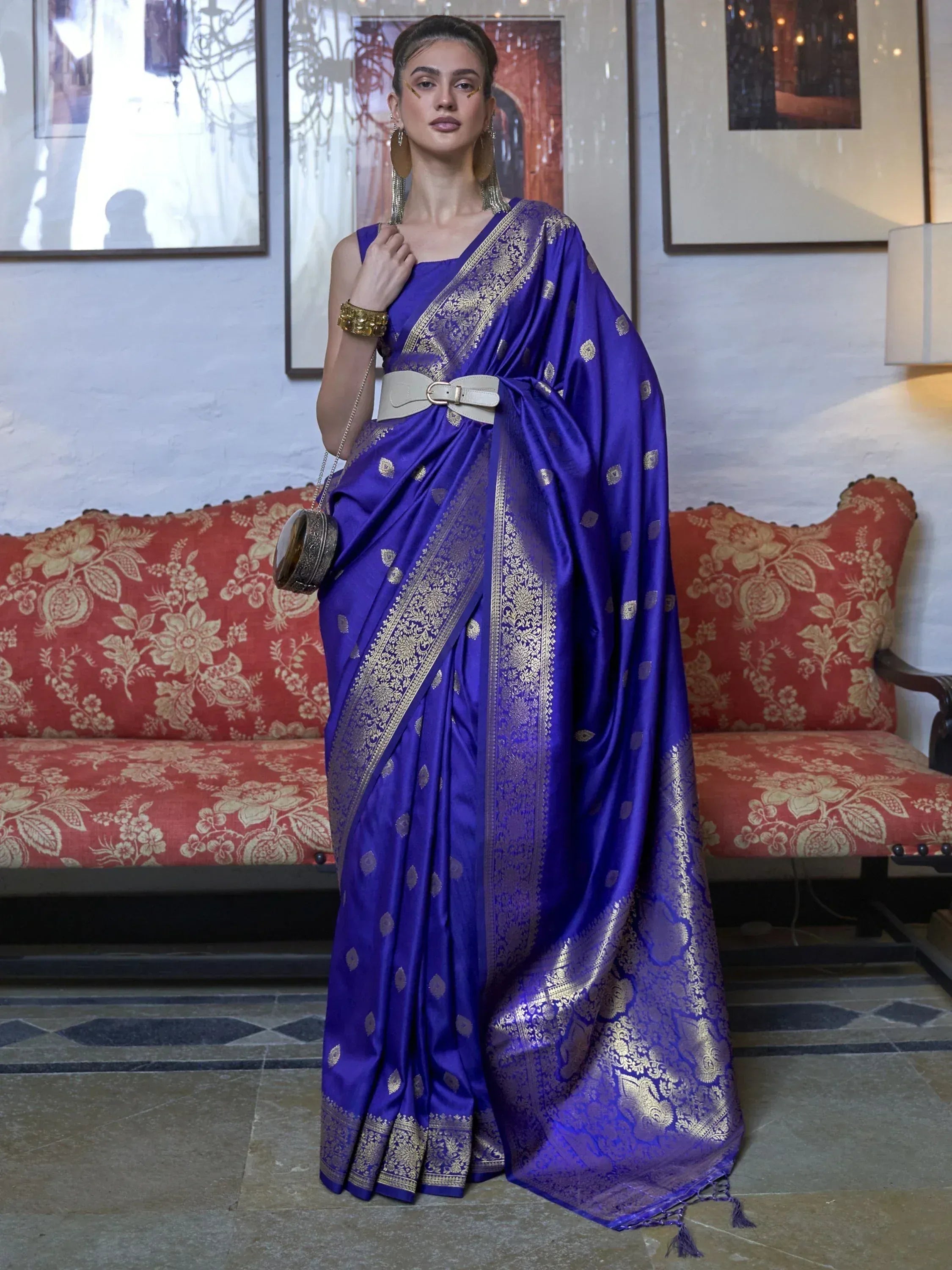 Royal blue silk saree with gold zari work, perfect for Indian ethnic wear and festive occasions.