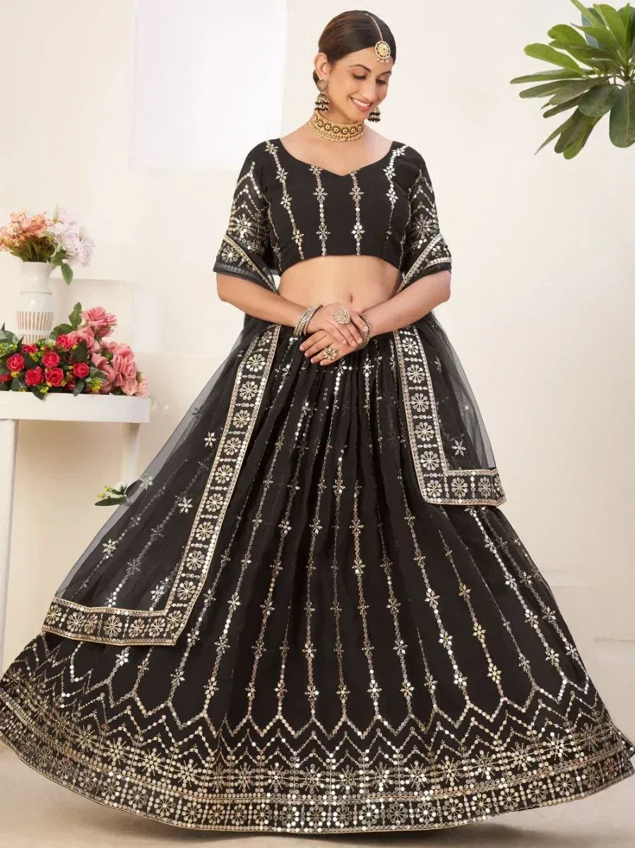 Black designer lehenga choli with gold mirror work, perfect for Indian ethnic wear events