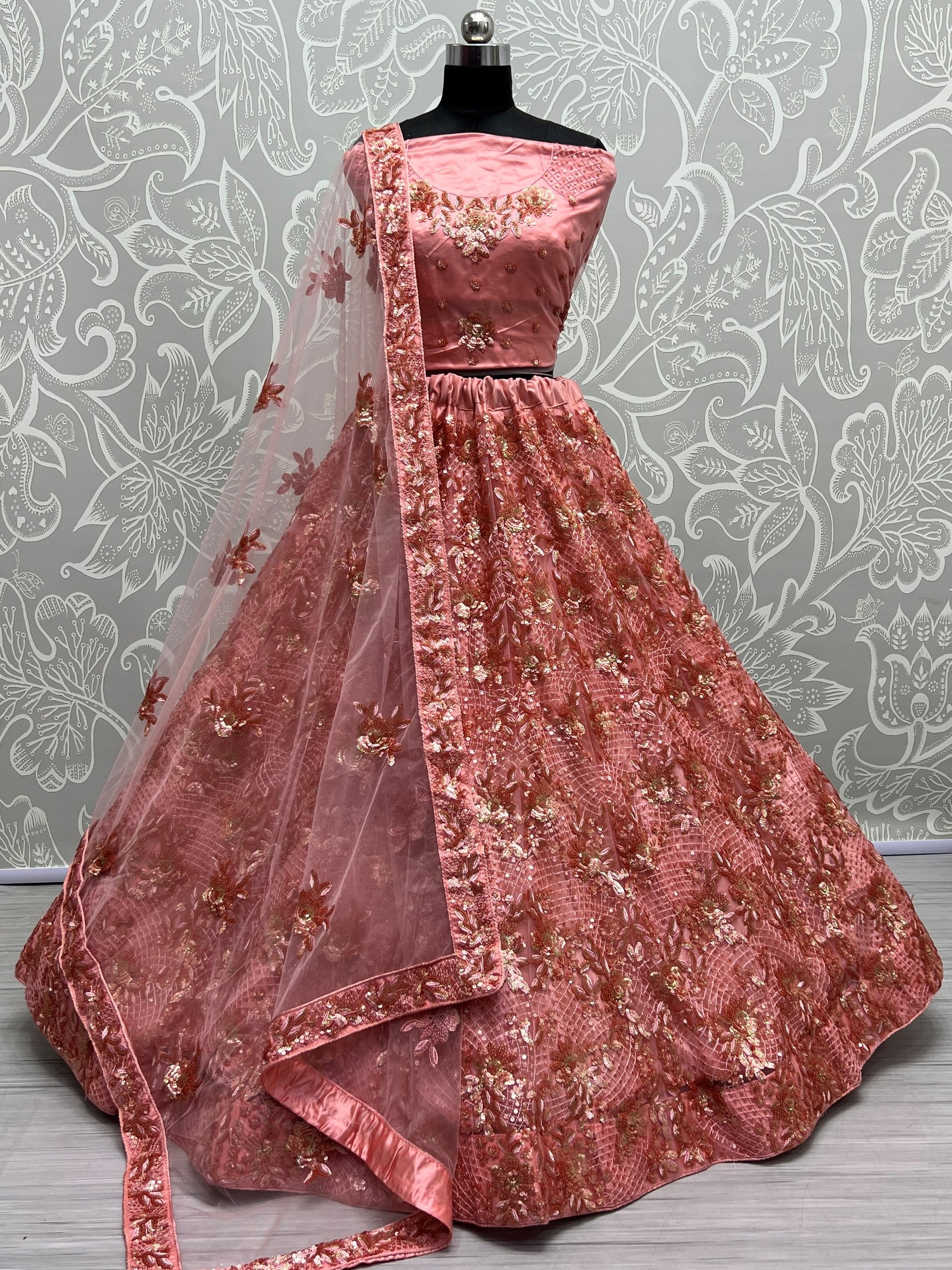 Superb Peach Sequins Net Reception Wear Lehenga With Blouse