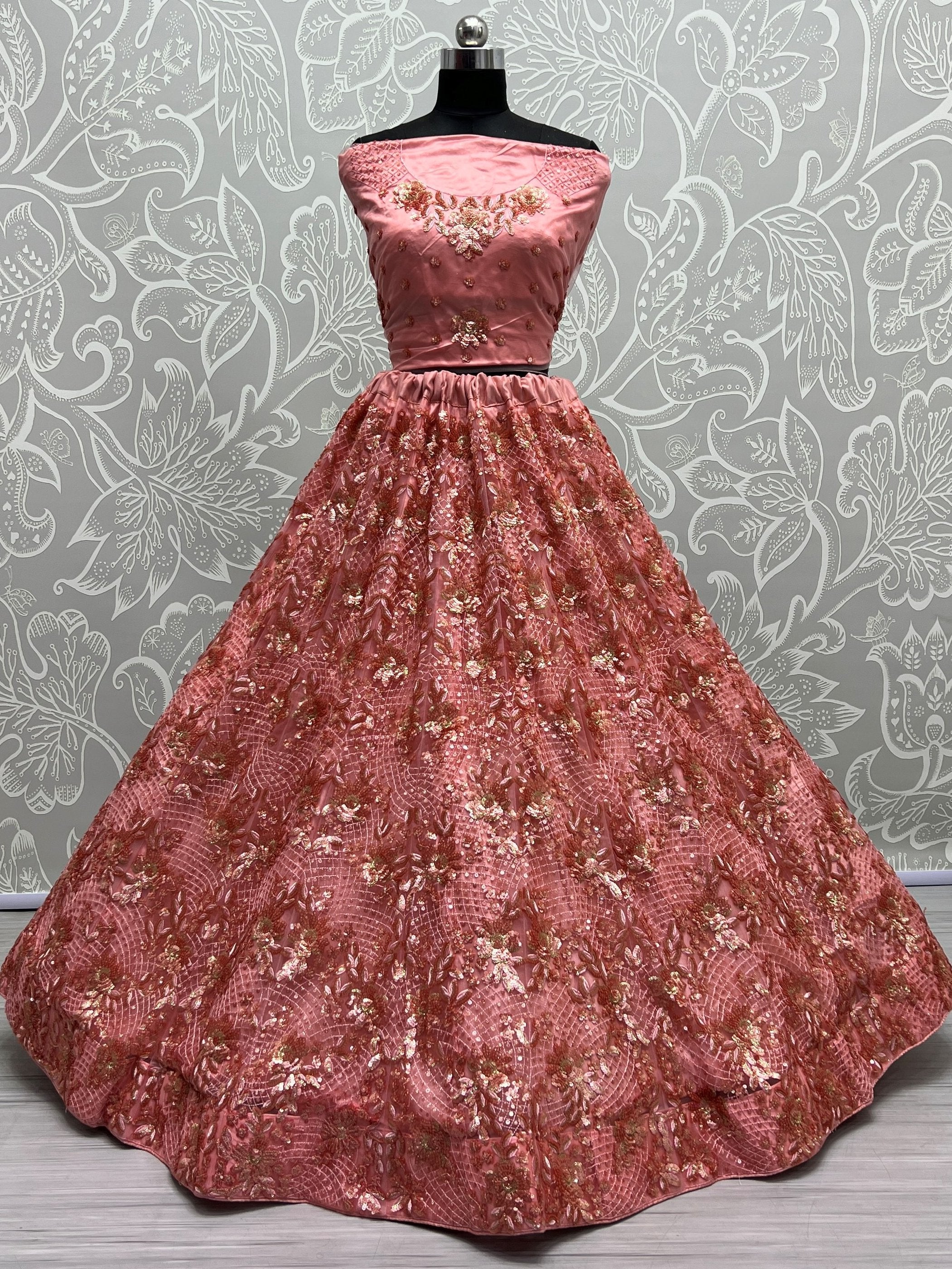 Superb Peach Sequins Net Reception Wear Lehenga With Blouse