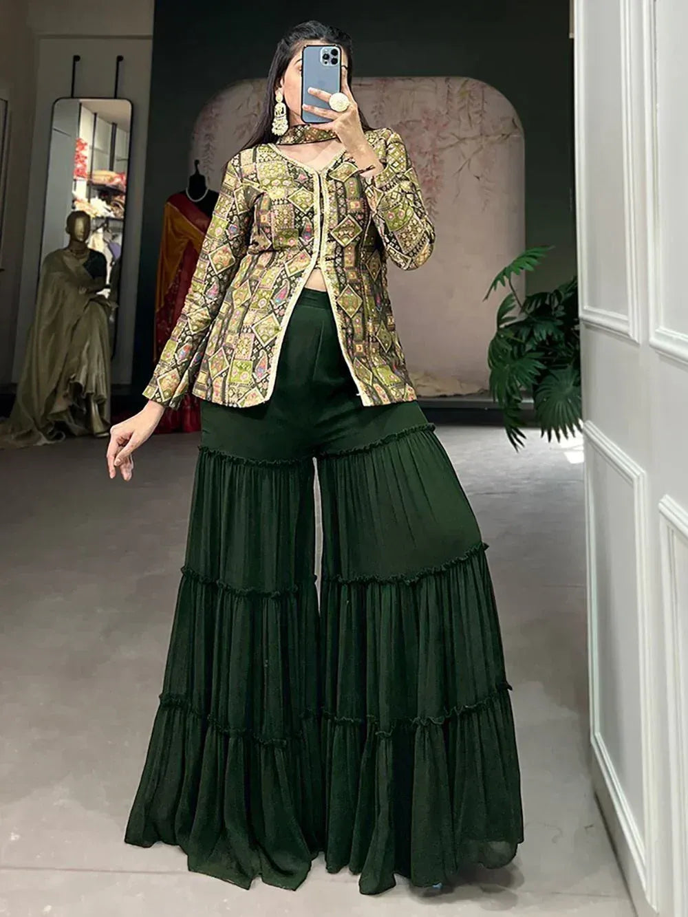 Woman in green tiered palazzo pants with printed ethnic jacket, perfect for Indian festive wear