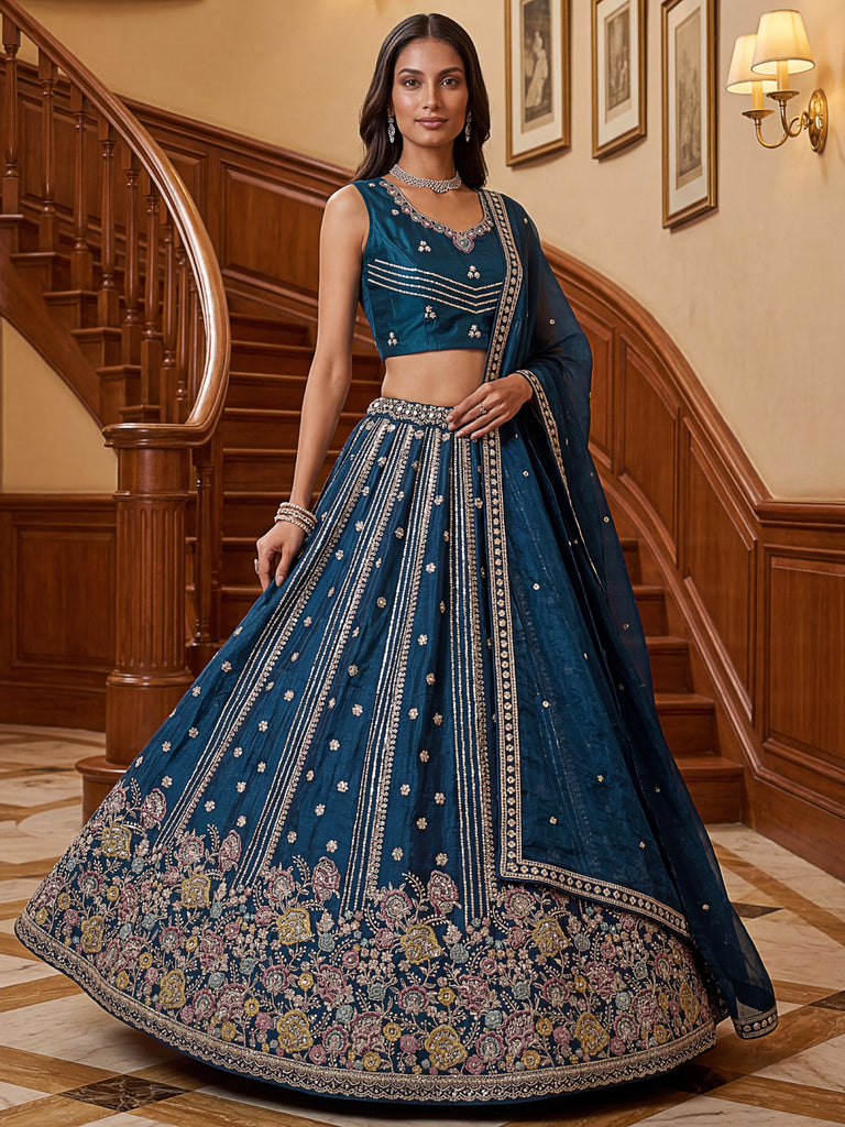 Dazzling Teal Blue Sequins Oragnza Marriage Wear Lehenga With Blouse