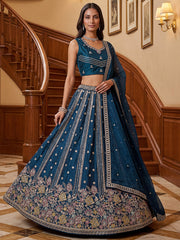 Dazzling Teal Blue Sequins Oragnza Marriage Wear Lehenga With Blouse