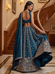 Dazzling Teal Blue Sequins Oragnza Marriage Wear Lehenga With Blouse