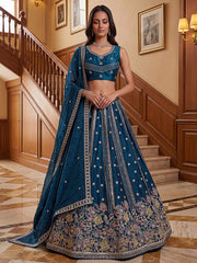 Dazzling Teal Blue Sequins Oragnza Marriage Wear Lehenga With Blouse