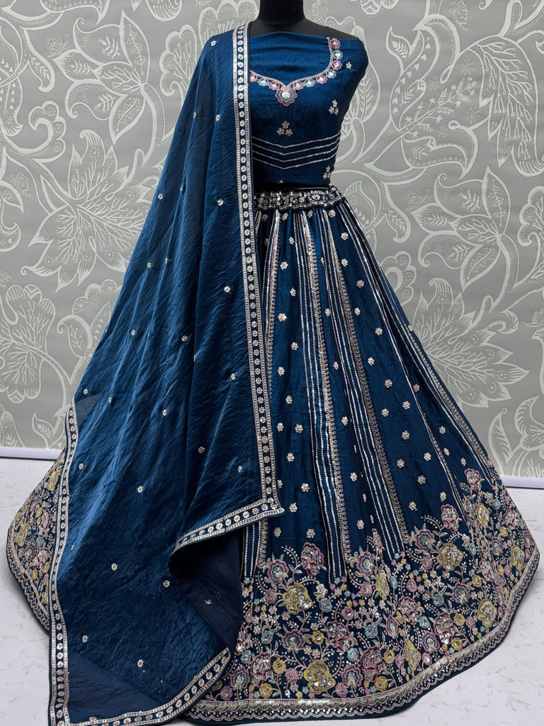 Dazzling Teal Blue Sequins Oragnza Marriage Wear Lehenga With Blouse