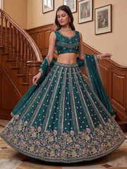 Ravishing Teal Green Embroidered Oragnza Mehendi Wear Lehenga With Blouse