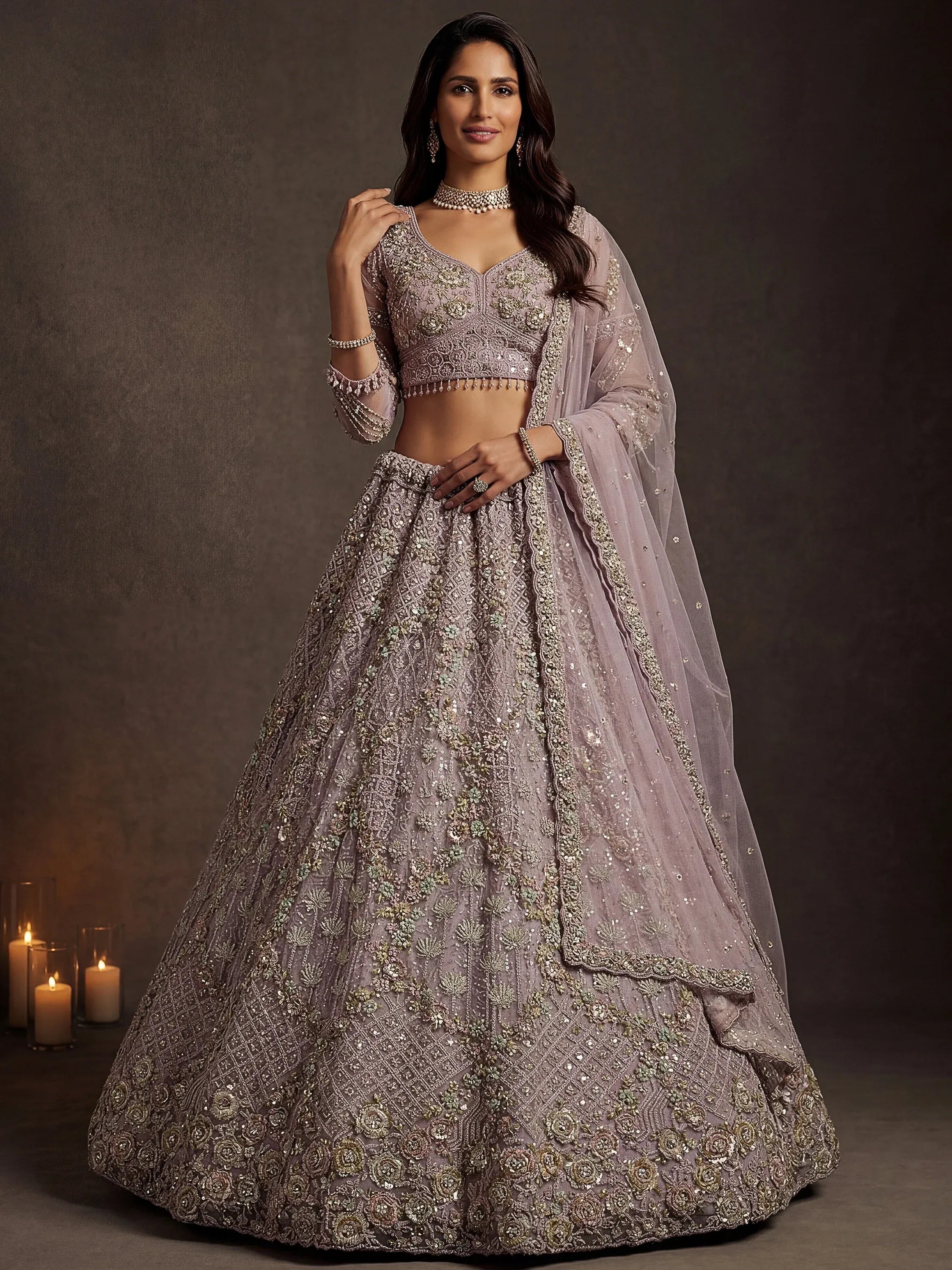 Notable Mauve Multi Thread Work Net Reception Wear Lehenga With Blouse