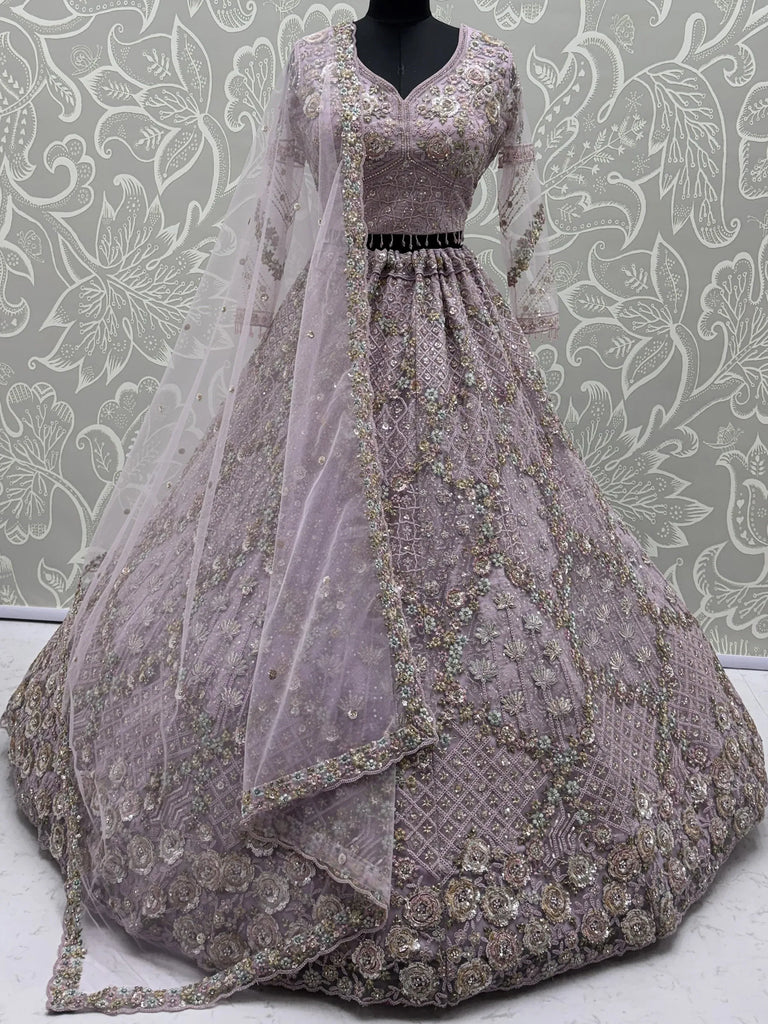 Notable Mauve Multi Thread Work Net Reception Wear Lehenga With Blouse