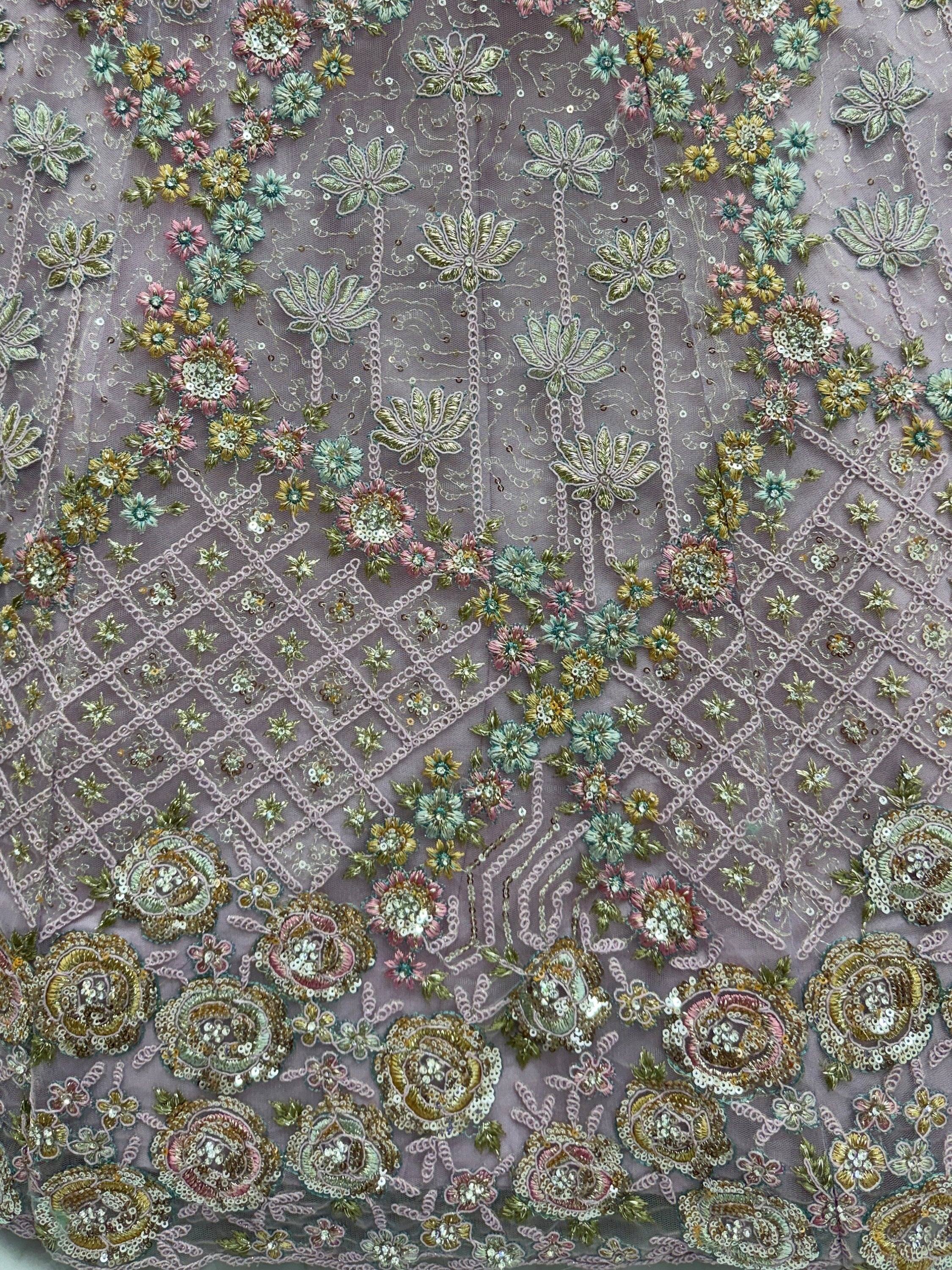 Notable Mauve Multi Thread Work Net Reception Wear Lehenga With Blouse