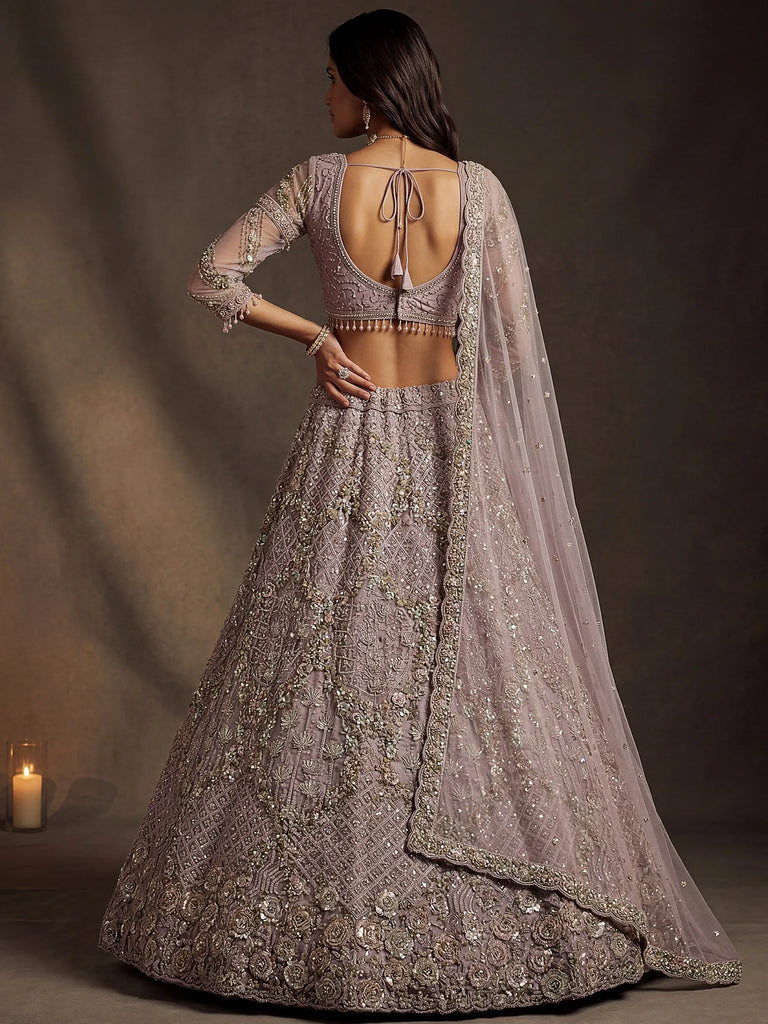 Notable Mauve Multi Thread Work Net Reception Wear Lehenga With Blouse