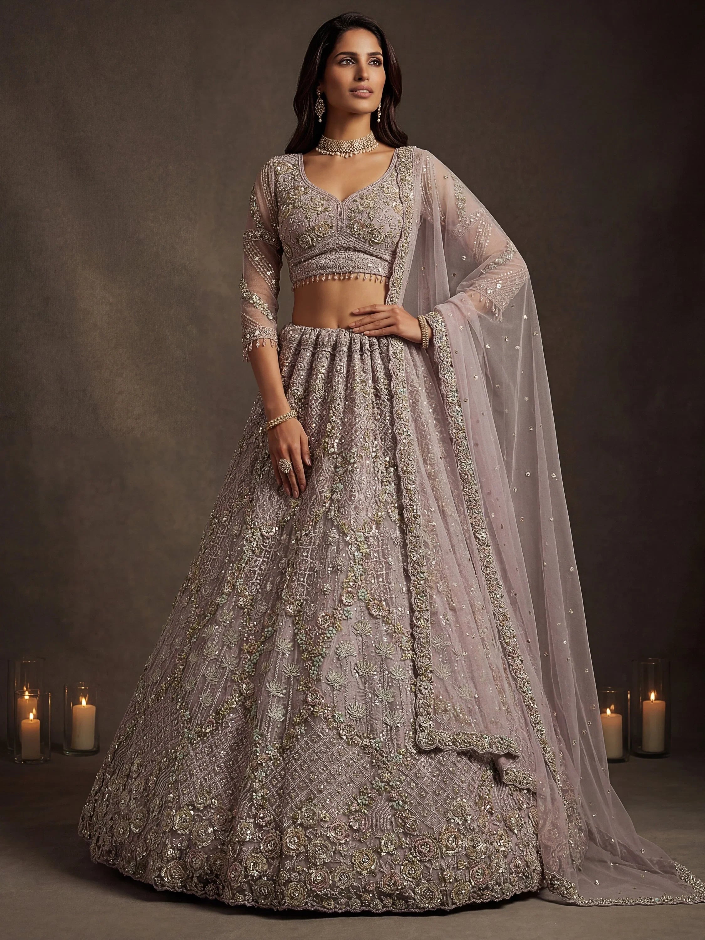 Notable Mauve Multi Thread Work Net Reception Wear Lehenga With Blouse