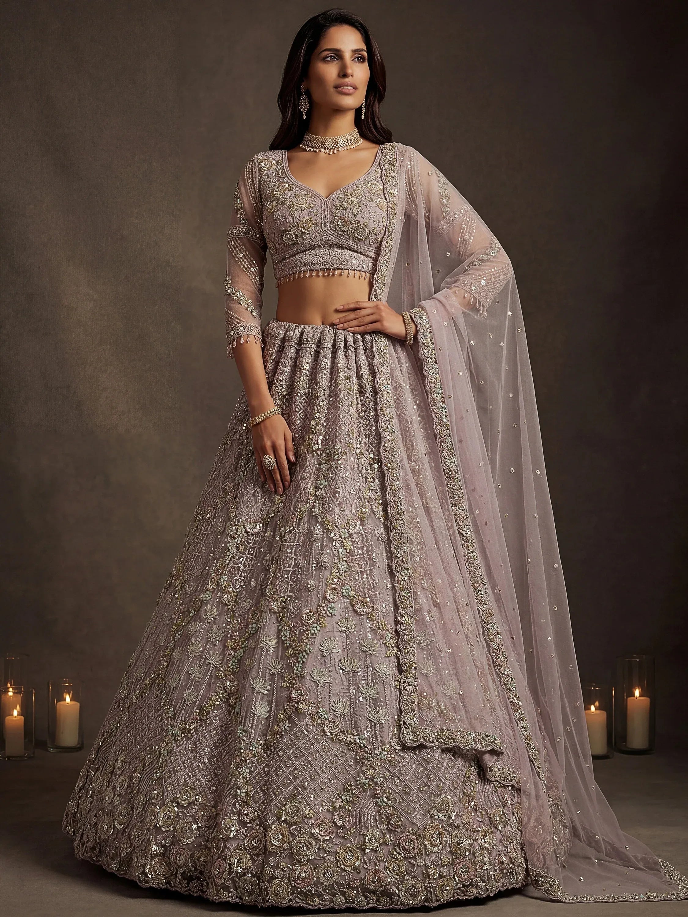 Notable Mauve Multi Thread Work Net Reception Wear Lehenga With Blouse