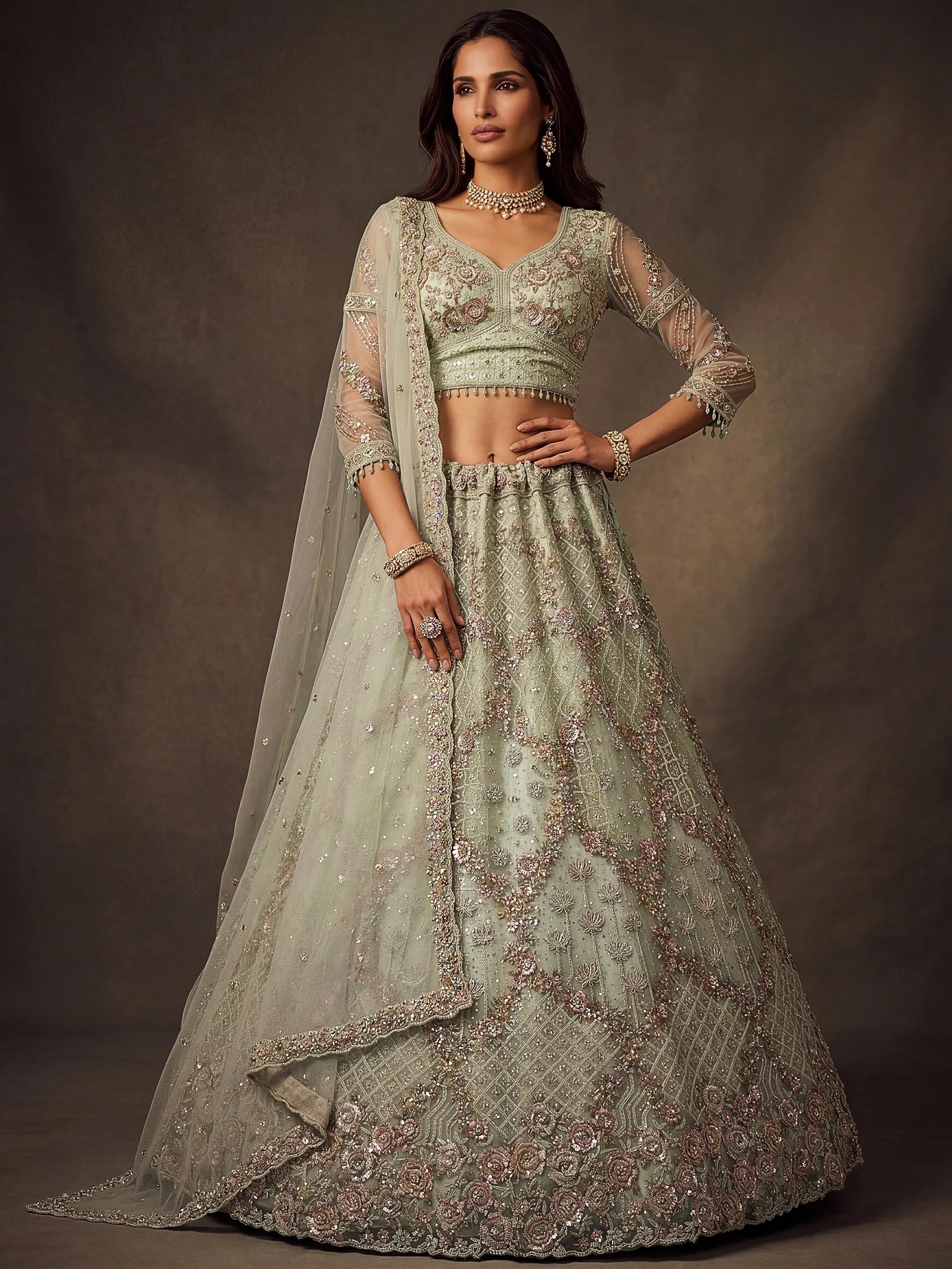Beautiful Pastel Green Sequins Net Bridesmaid Lehenga Choli
