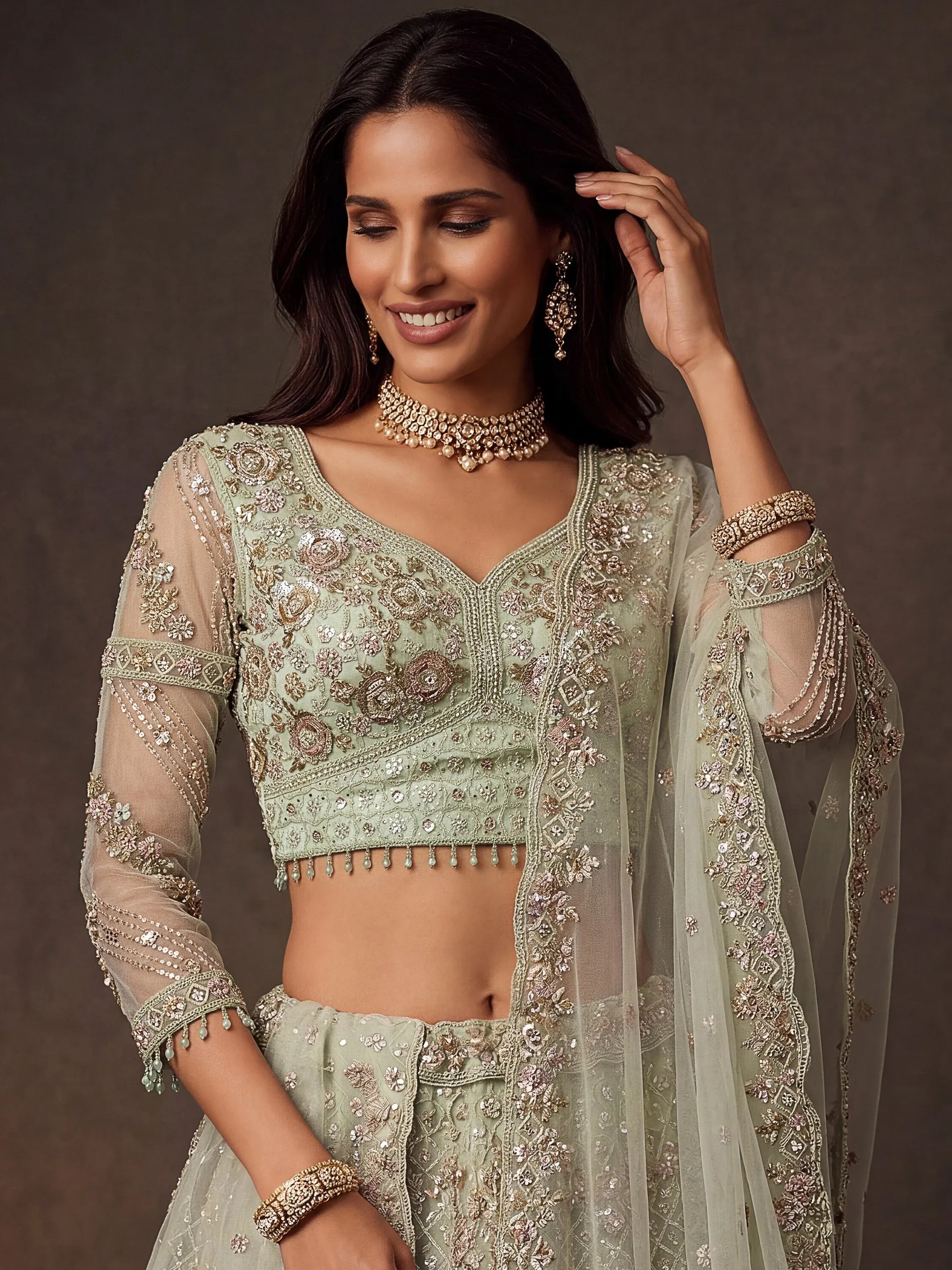 Beautiful Pastel Green Sequins Net Bridesmaid Lehenga Choli