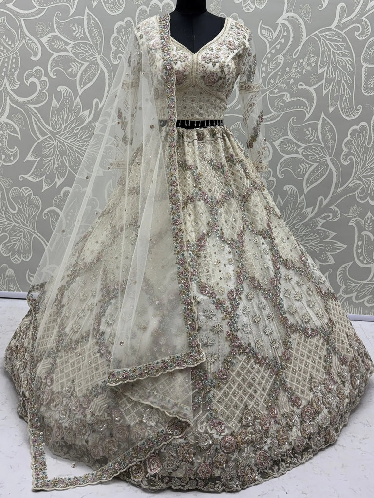 Grand White Heavy Embroidered Net Cocktail Wear Lehenga Choli With Dupatta