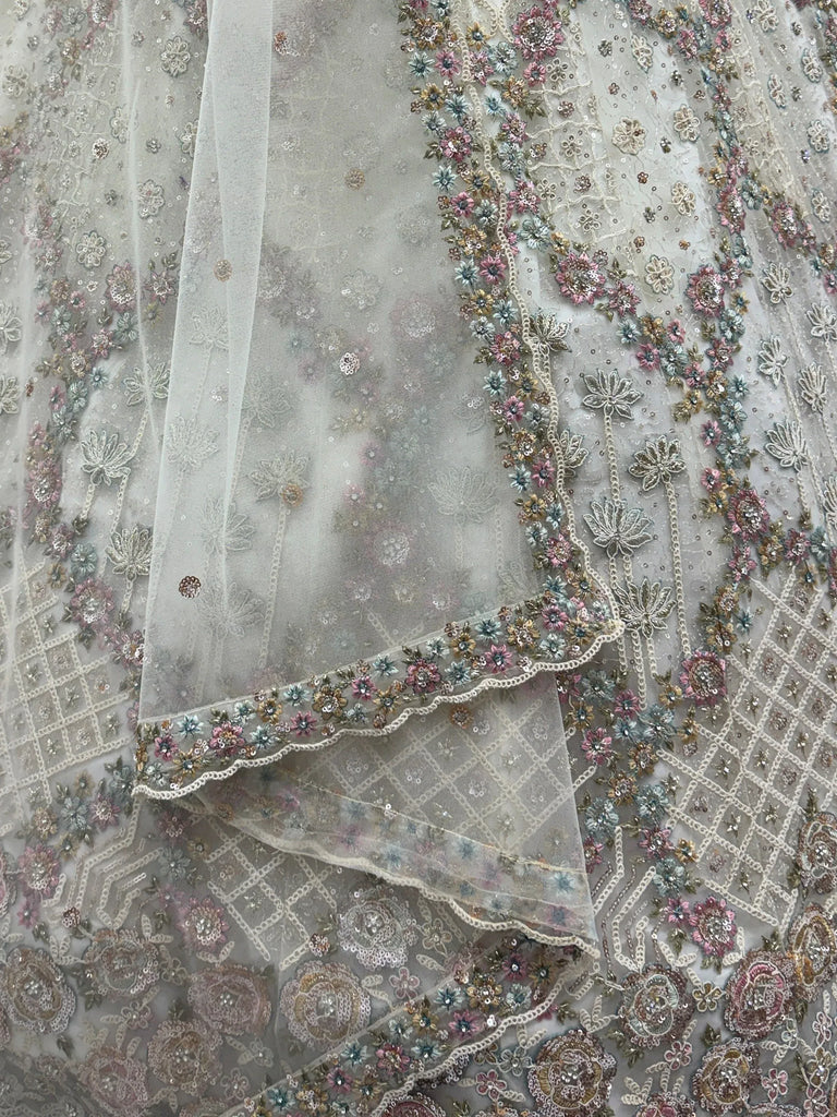 Grand White Heavy Embroidered Net Cocktail Wear Lehenga Choli With Dupatta