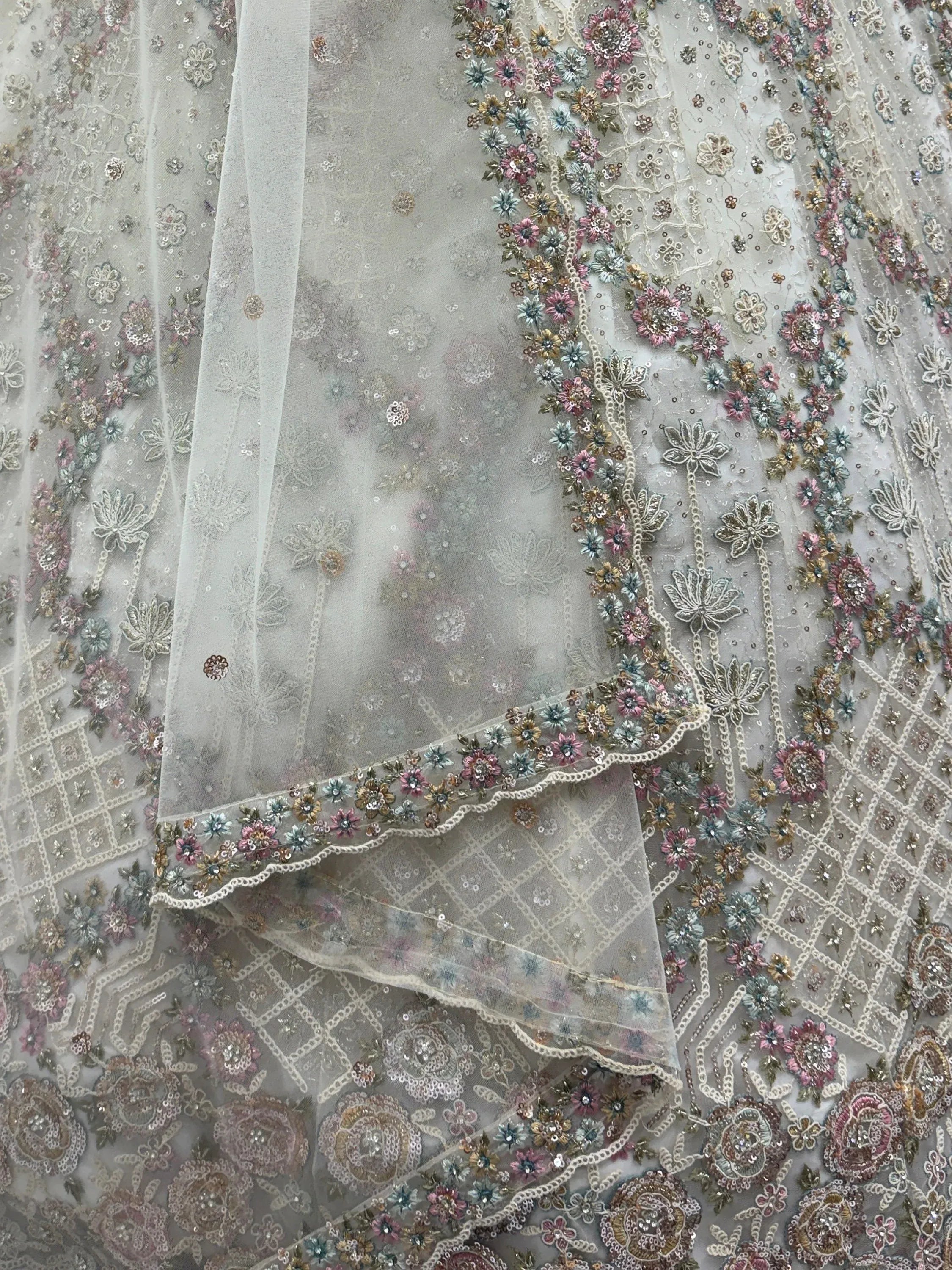 Grand White Heavy Embroidered Net Cocktail Wear Lehenga Choli With Dupatta