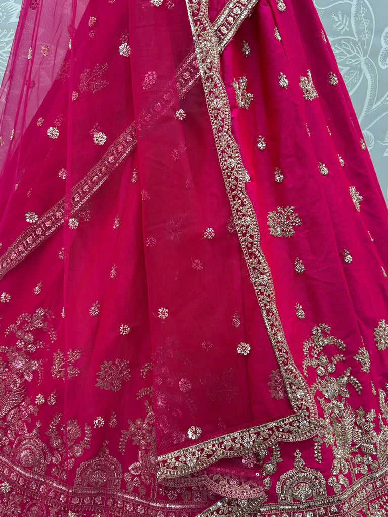 Alluring Rani Pink Zari Embroidered Silk Bridal Lehenga Choli With Double Dupatta