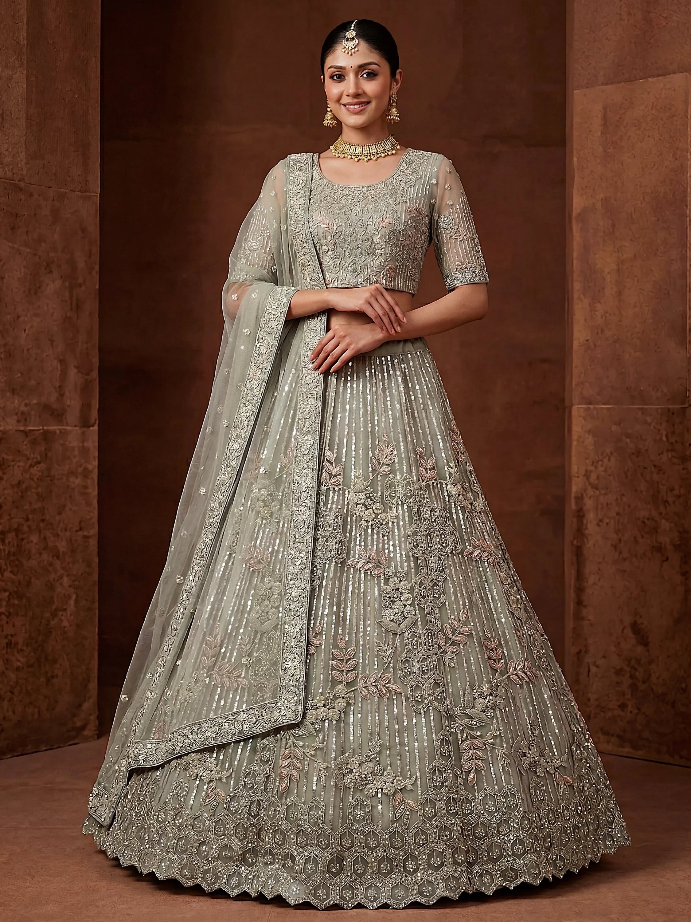 Lavish Green Dori Embroidered Net Wedding Wear Lehenga choli