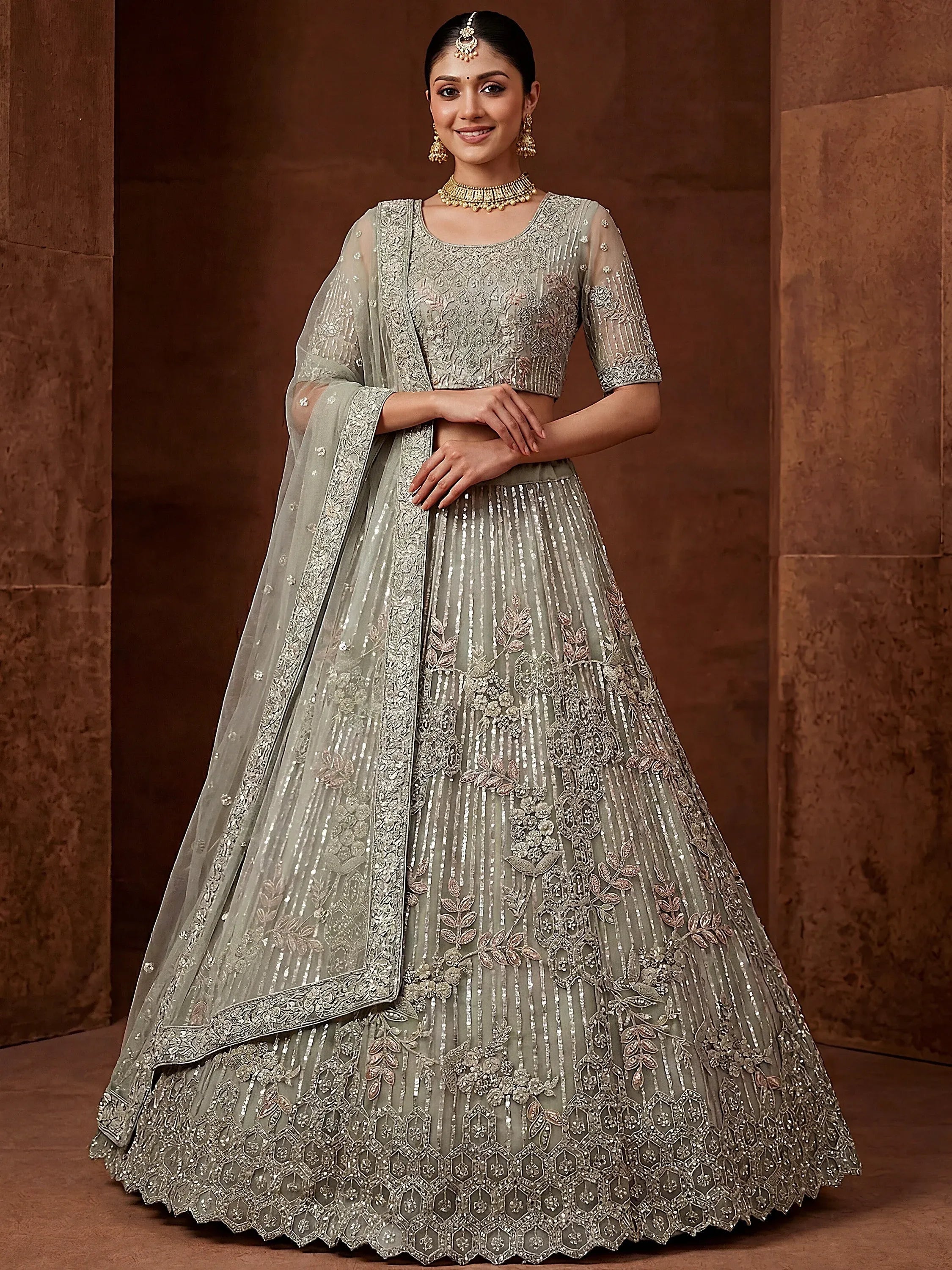Lavish Green Dori Embroidered Net Wedding Wear Lehenga Choli