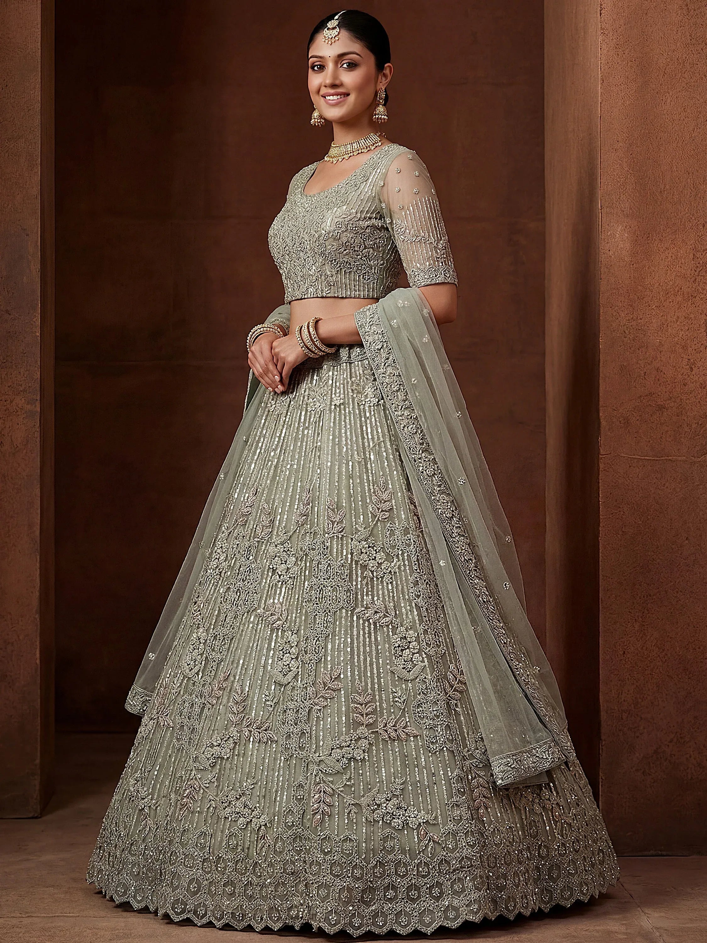 Lavish Green Dori Embroidered Net Wedding Wear Lehenga Choli