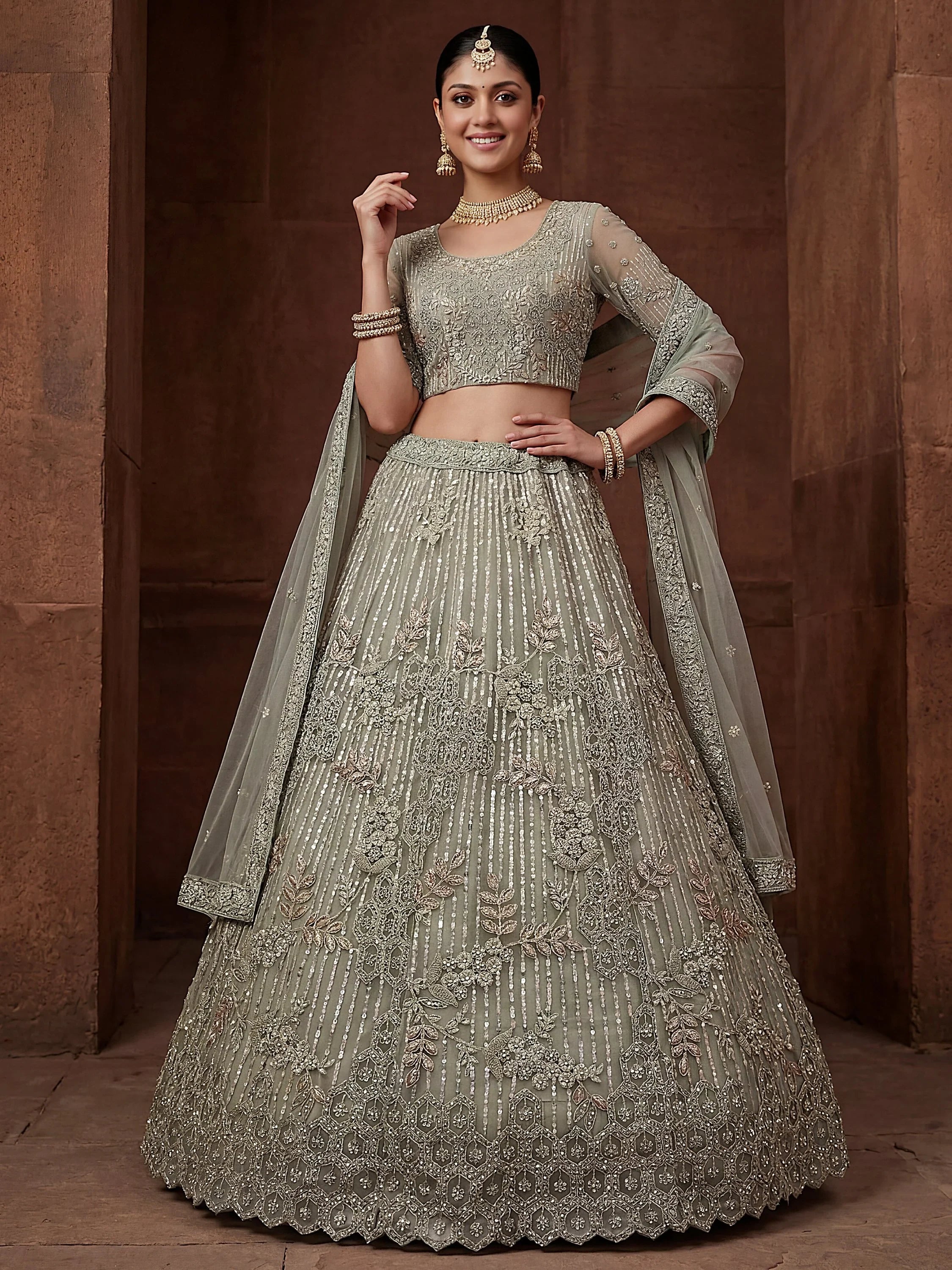 Lavish Green Dori Embroidered Net Wedding Wear Lehenga choli