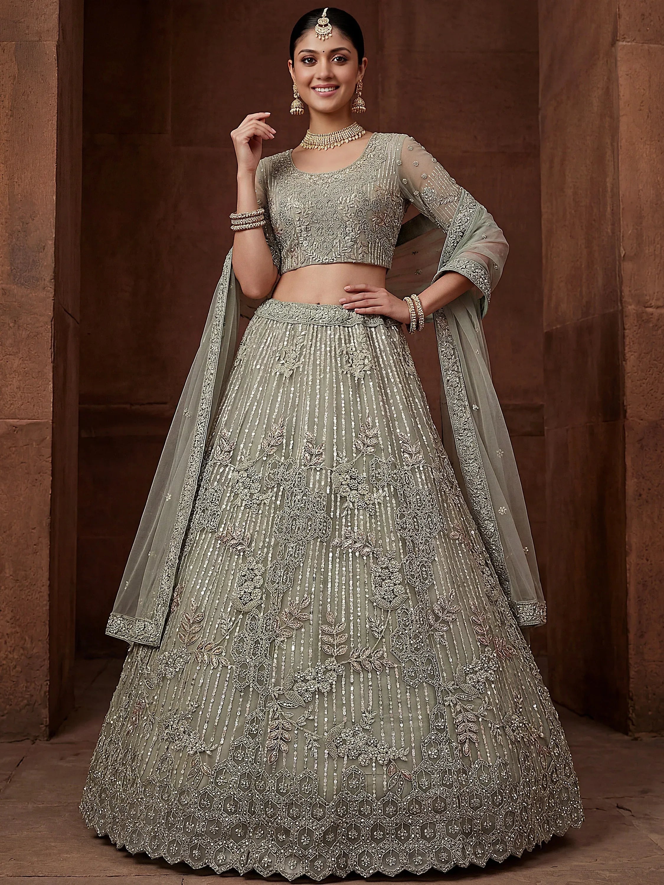 Lavish Green Dori Embroidered Net Wedding Wear Lehenga Choli