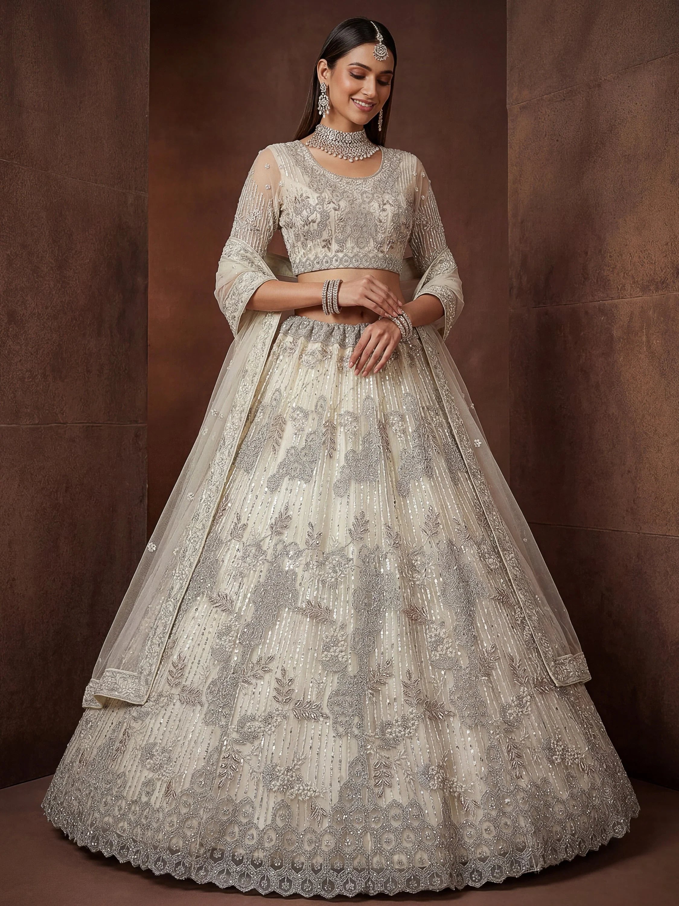 Sparkling Cream Zari Work Net Reception Wear Lehenga Choli With Dupatta