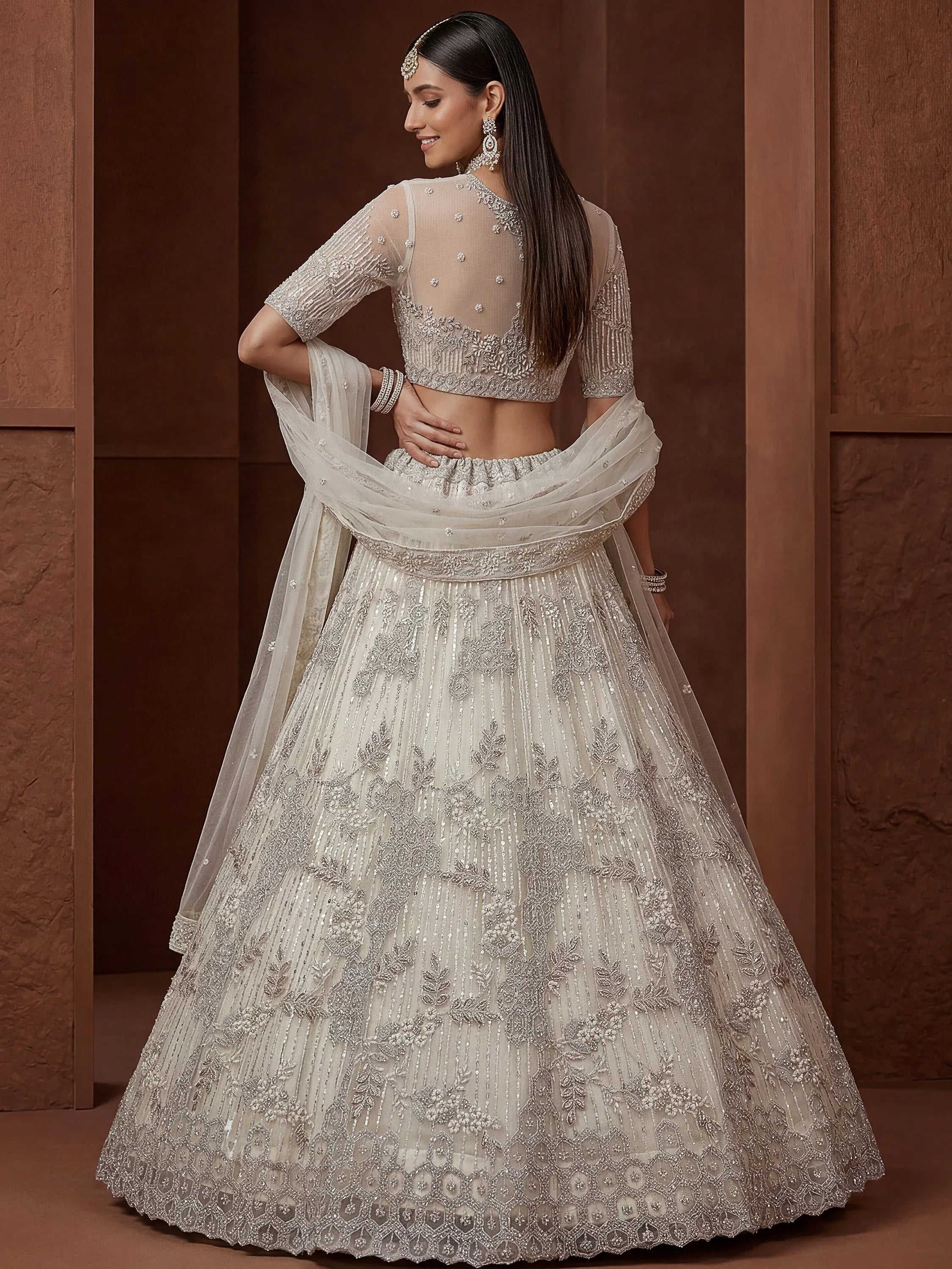 Noteworthy Beige Sequins Net Sangeet Wear Lehenga Choli With Dupatta