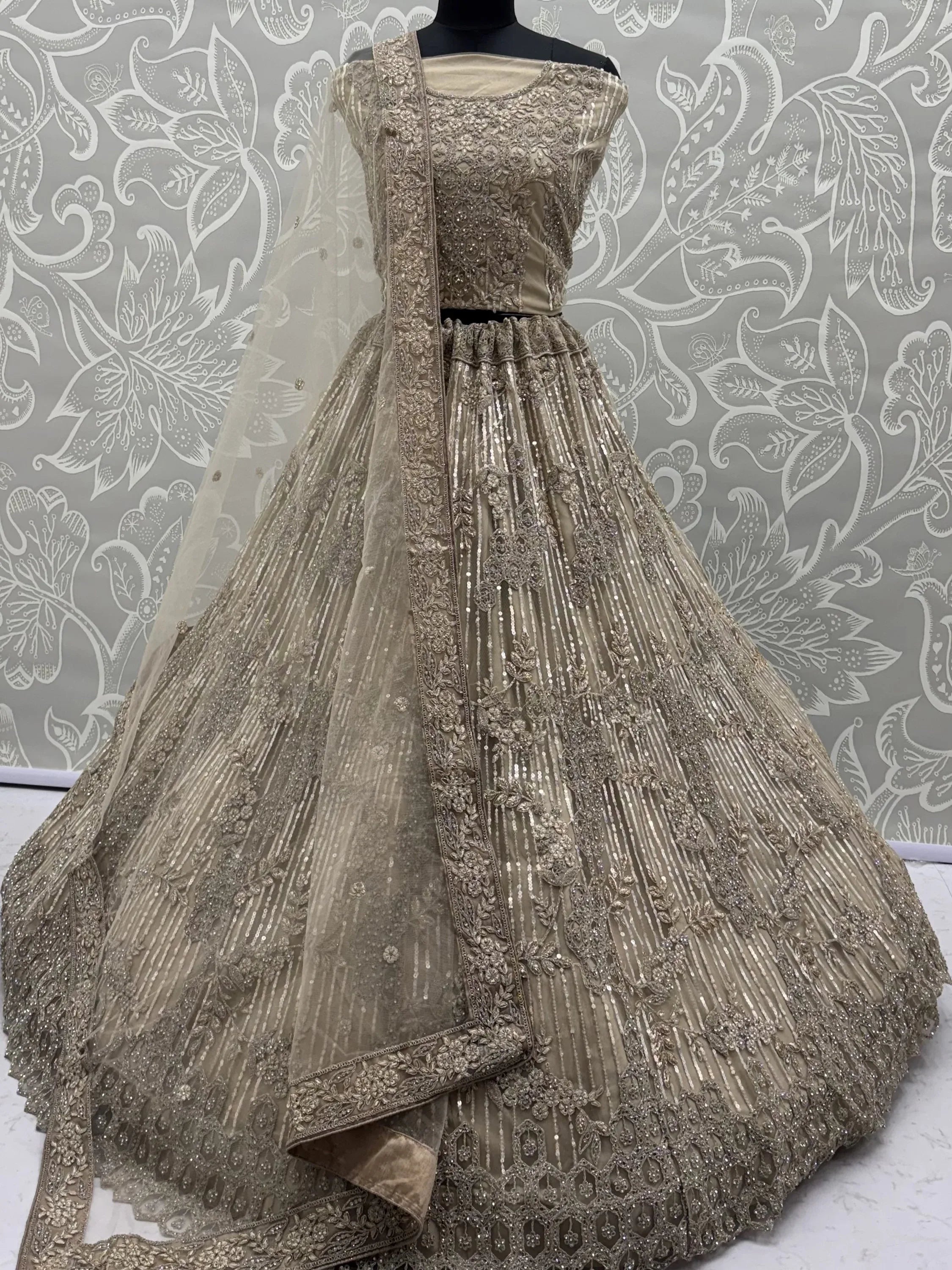 Noteworthy Beige Sequins Net Sangeet Wear Lehenga Choli With Dupatta