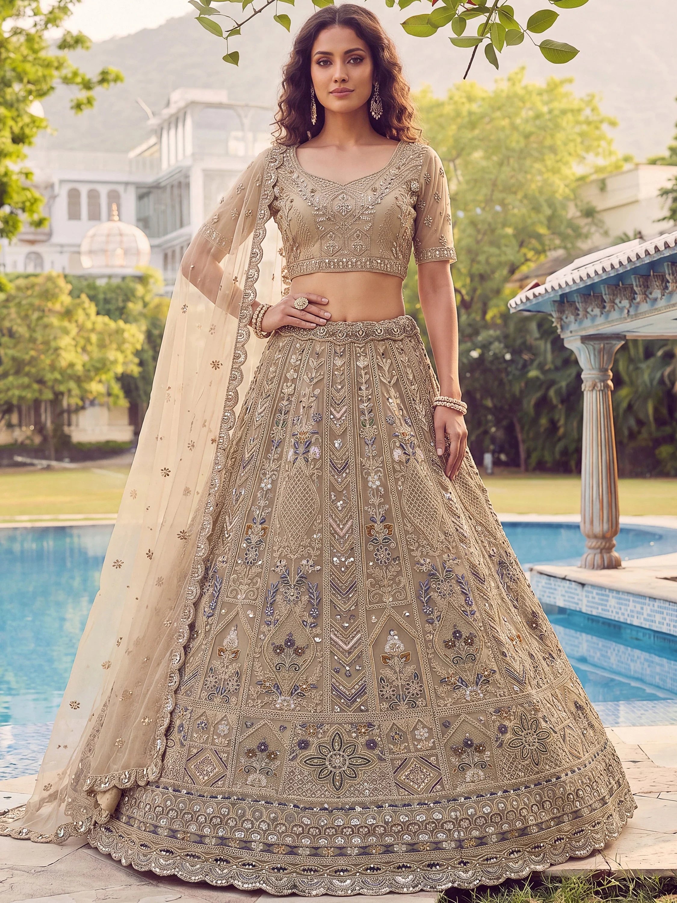 Shiny Beige Embroidered Net Reception Wear Lehenga Choli With Dupatta
