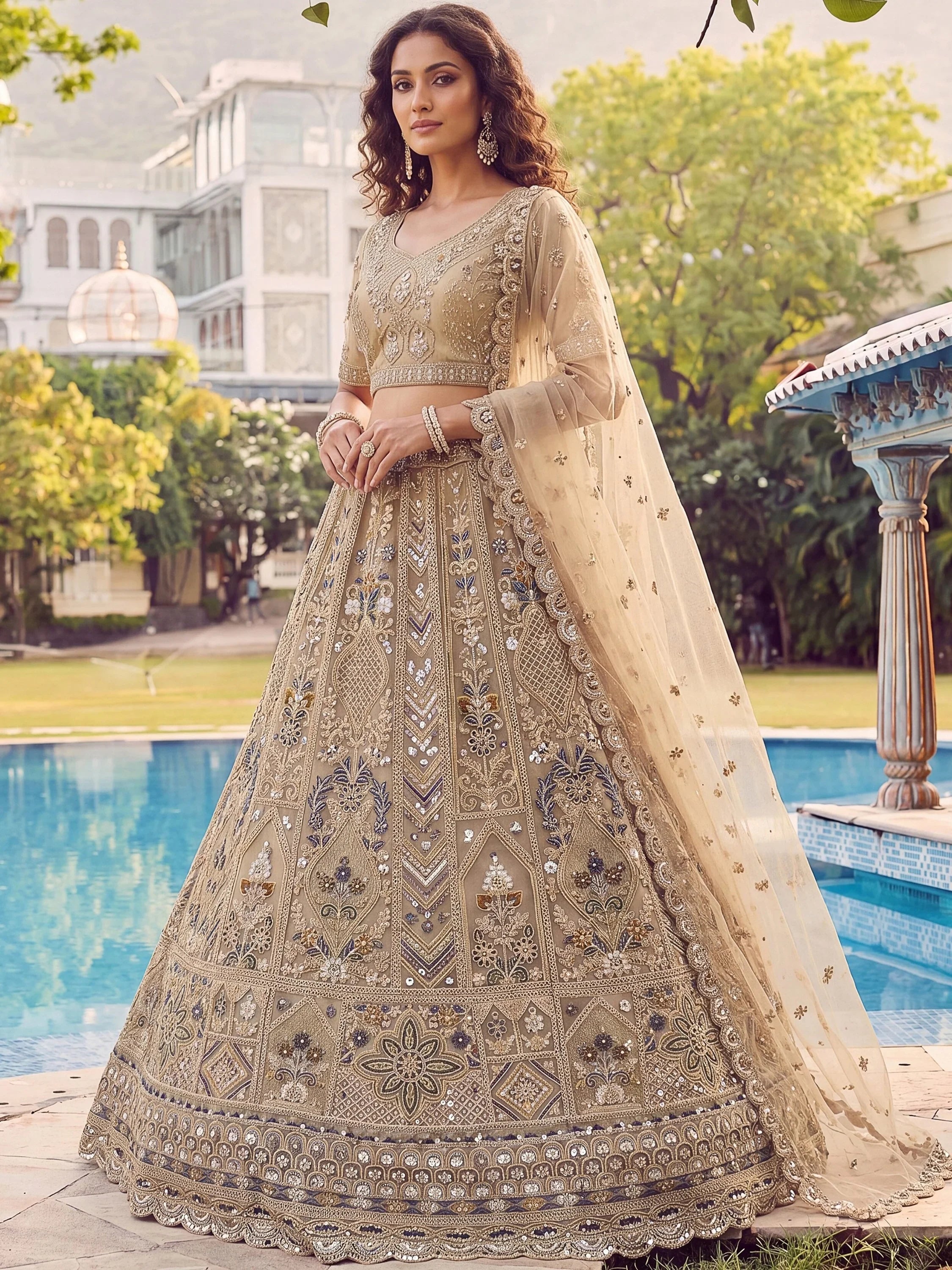 Shiny Beige Embroidered Net Reception Wear Lehenga Choli With Dupatta
