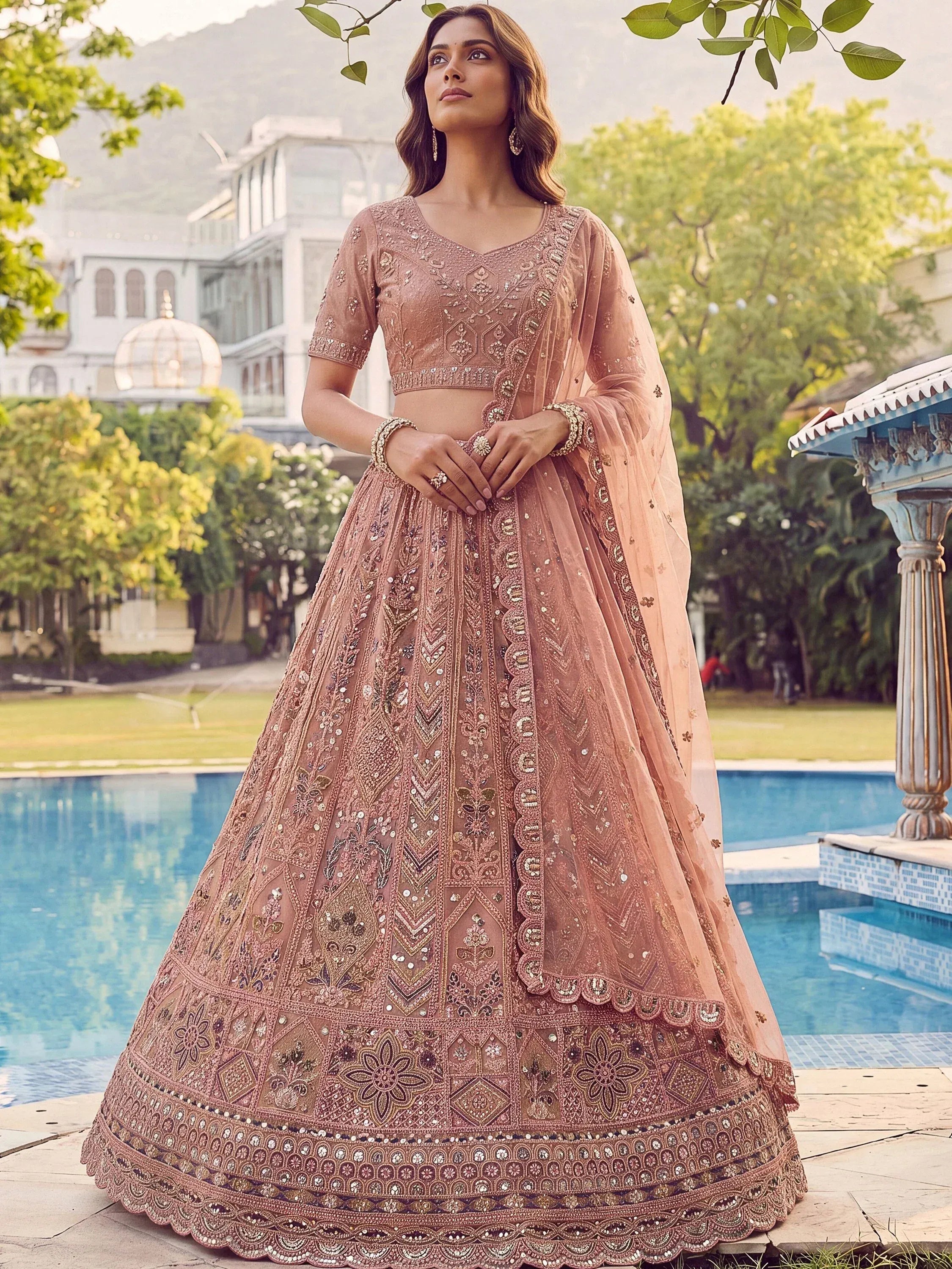 Glowing Peach Embroidered Net Wedding Wear Lehenga Choli with Dupatta